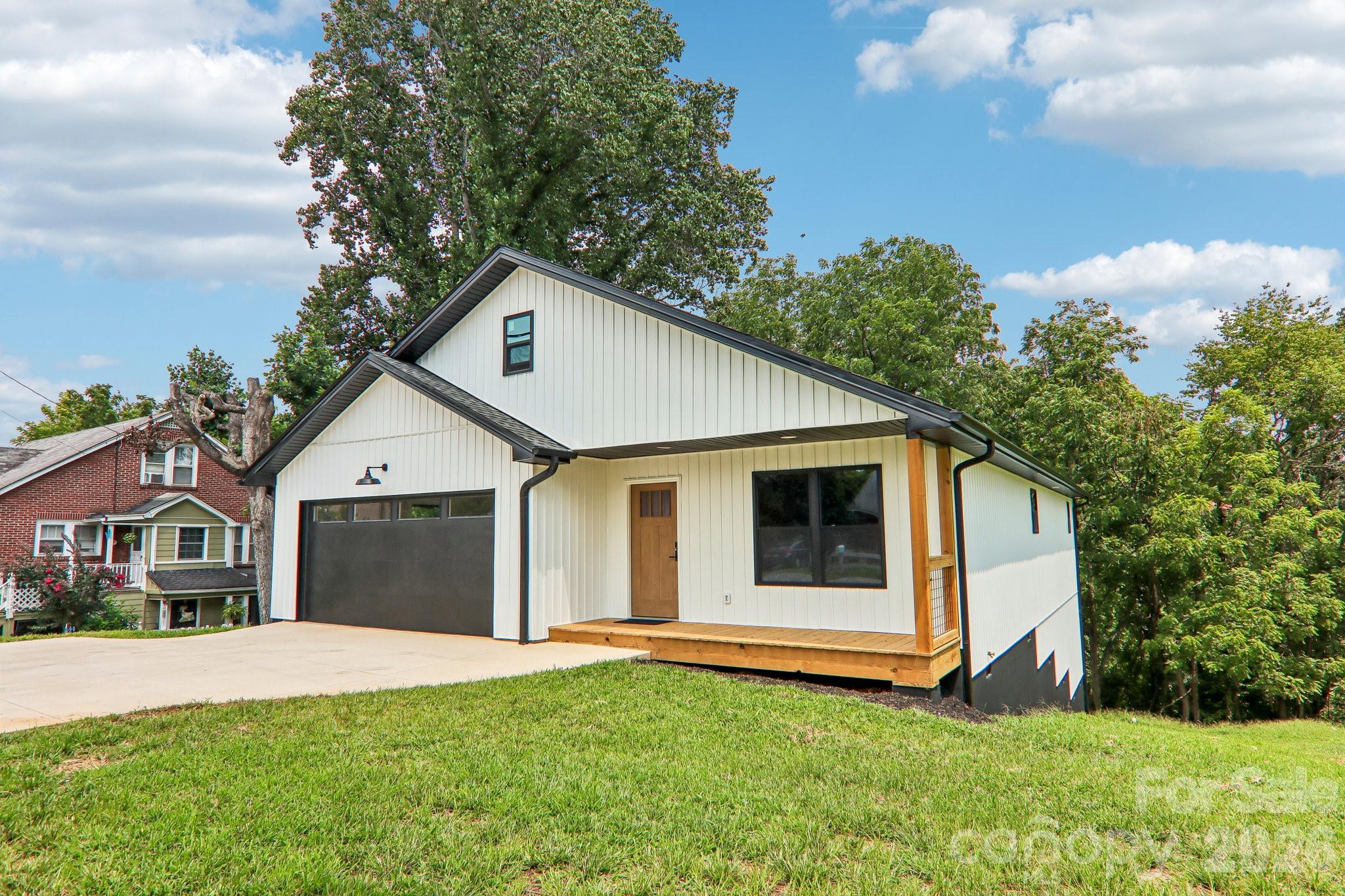 2 car garage with one step entry. - 140 N Main Street, Mars Hill