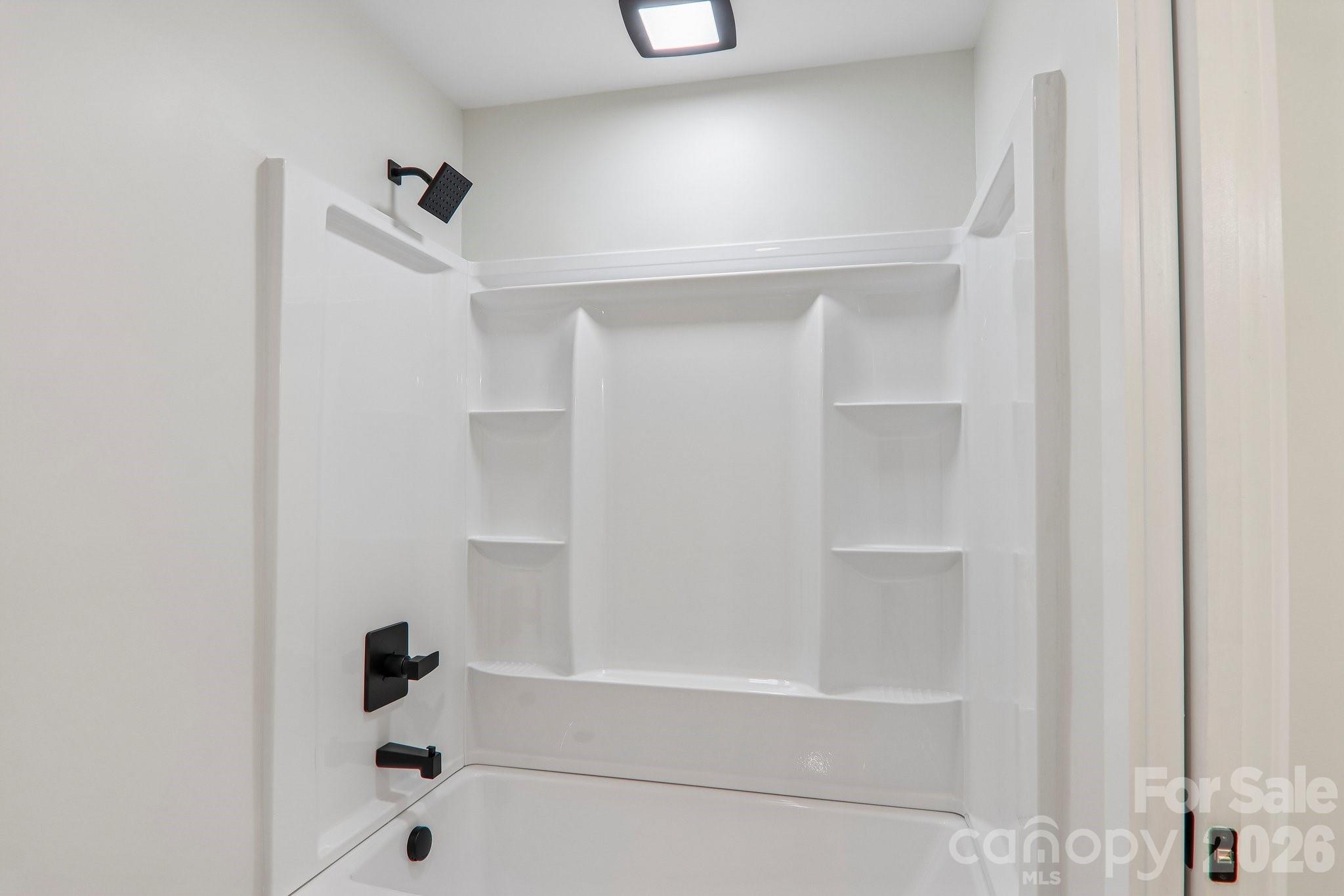 Hall bathroom Tub/Shower combo. - 140 N Main Street, Mars Hill