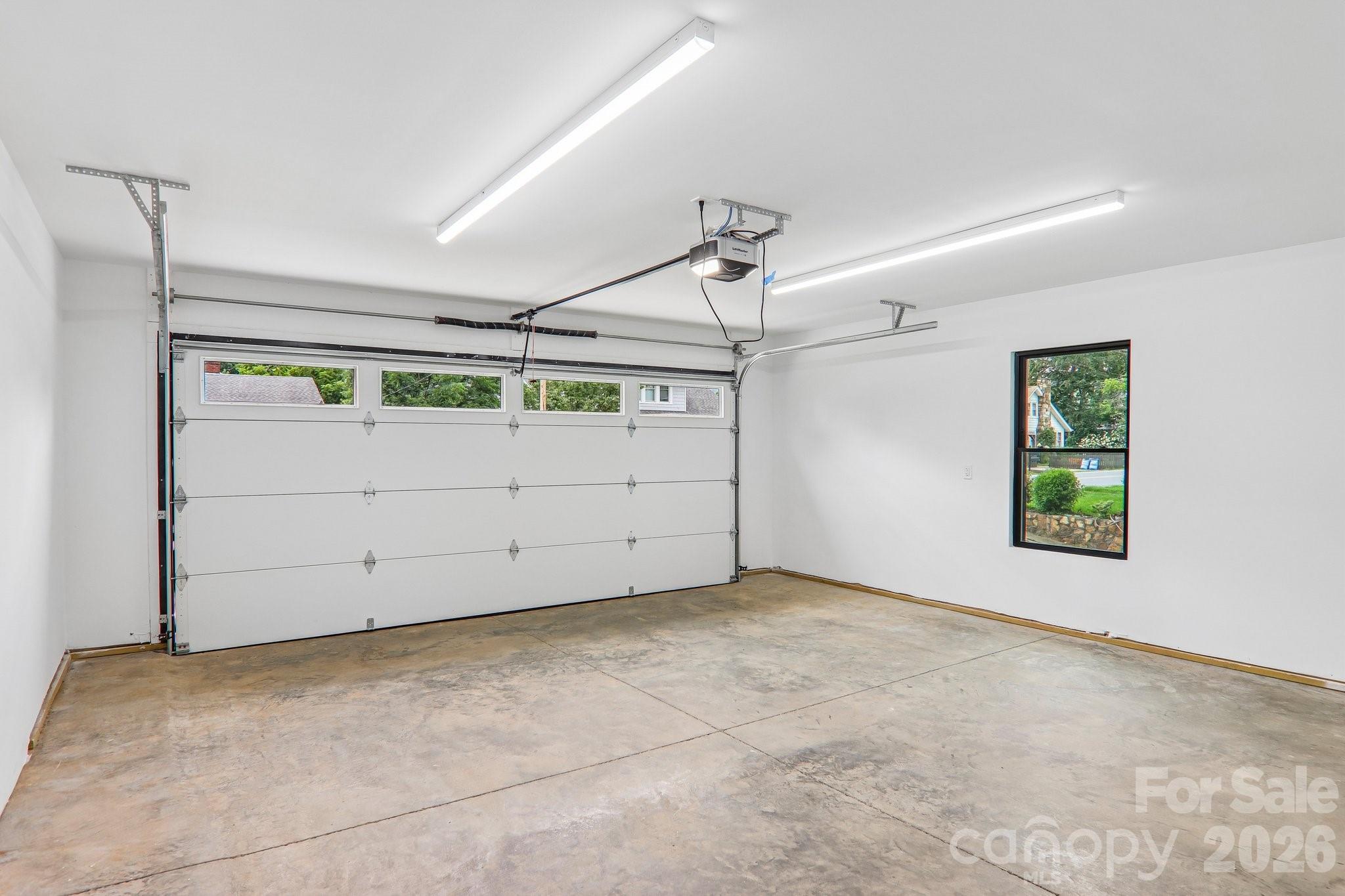 Two car garage with storage closet. - 140 N Main Street, Mars Hill