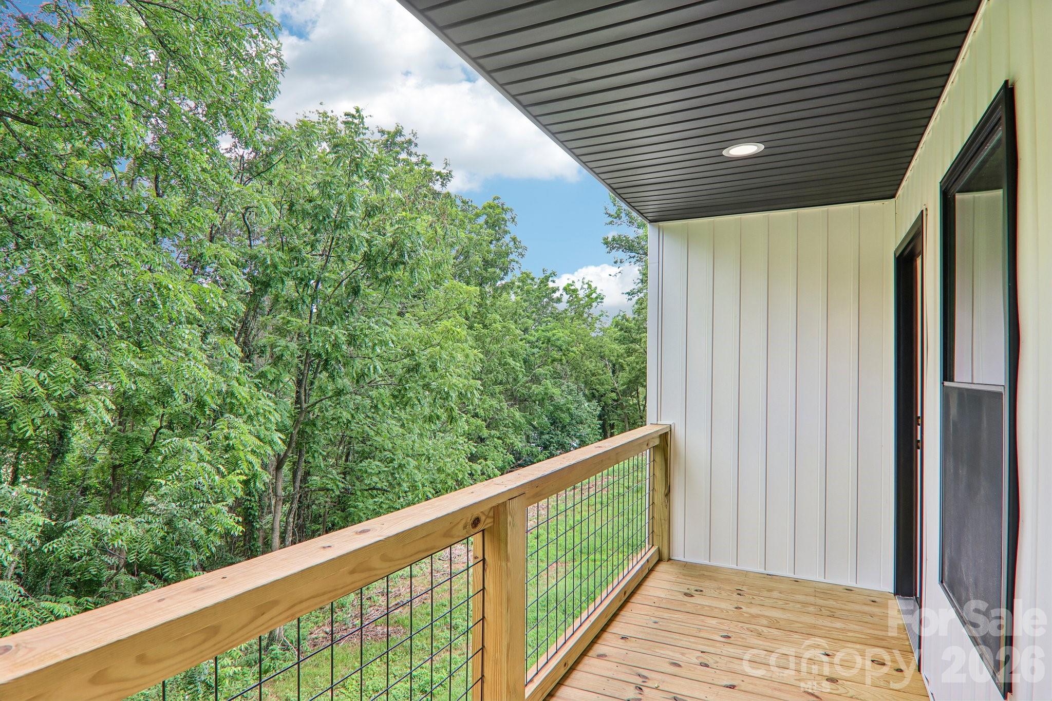 Covered back deck for sunrise's & morning coffee. - 140 N Main Street, Mars Hill