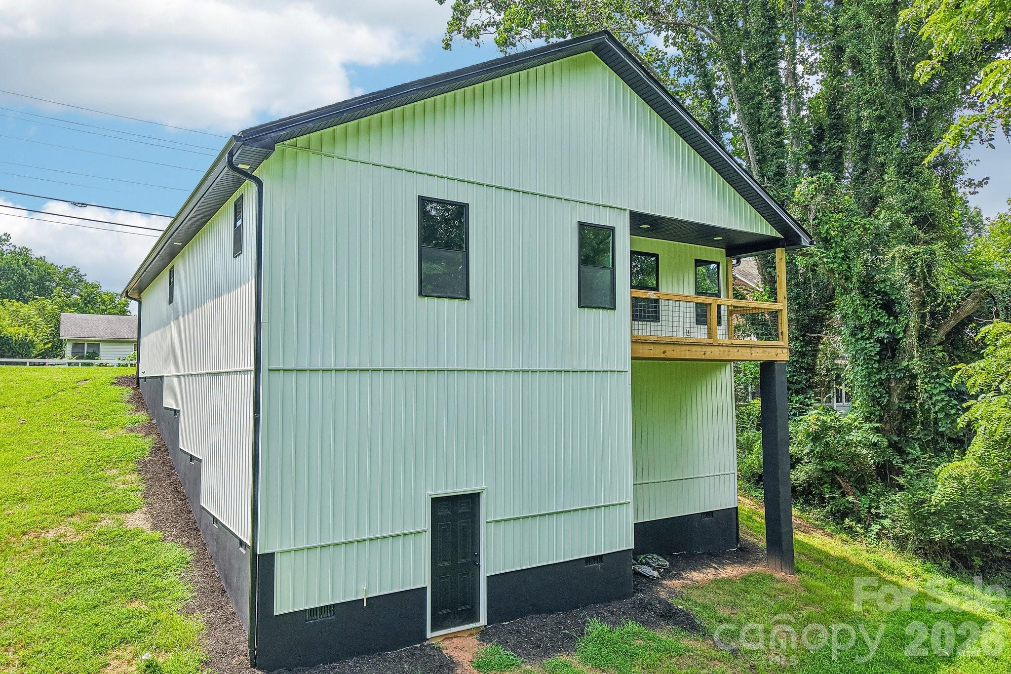 Large lower level for mechanicals has gravel floor bed. This space offers endless possibilities. - 140 N Main Street, Mars Hill