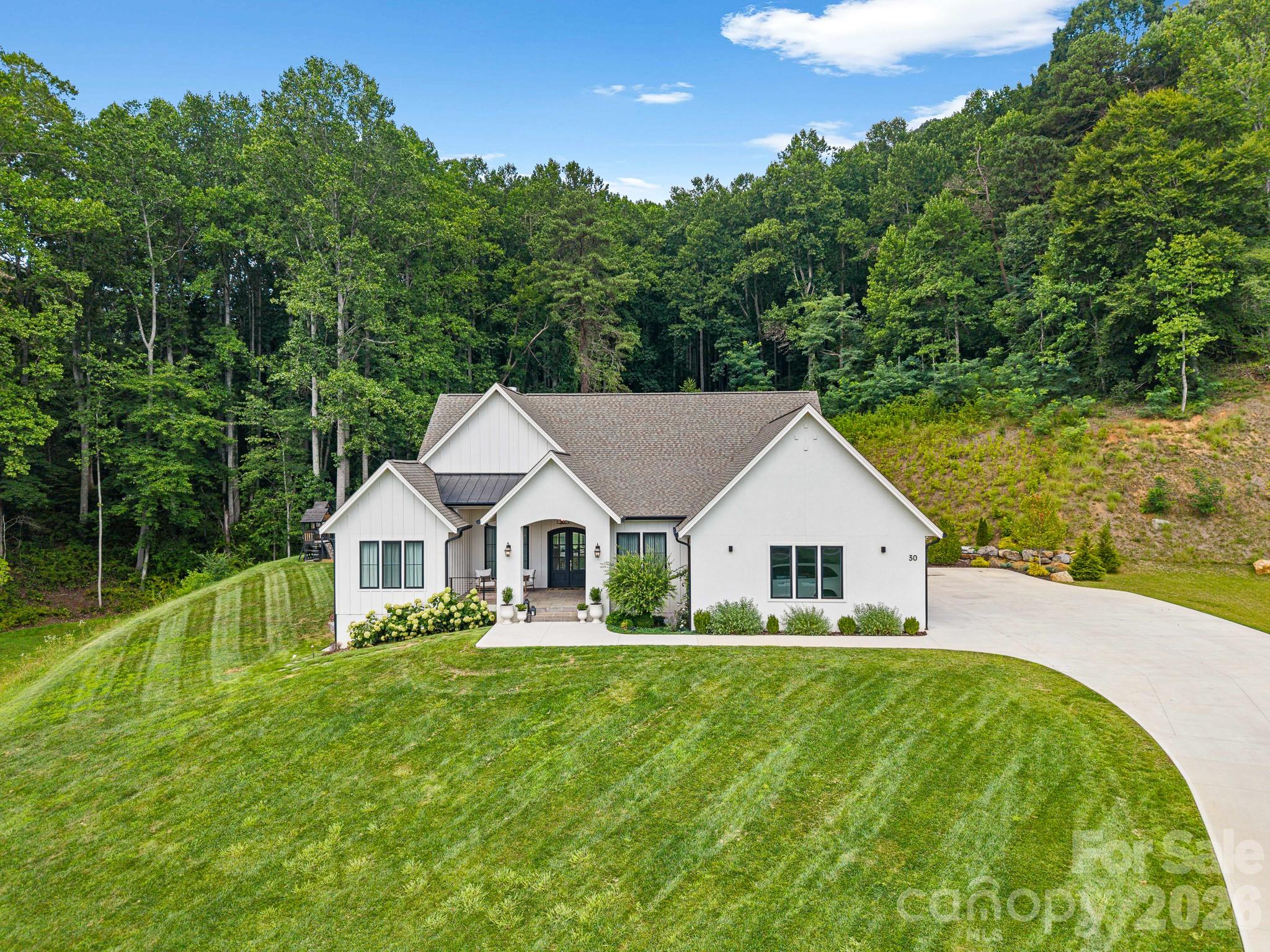 Single Family Residence at 30 Bridgeway Drive, Candler, photo 5 of 46
