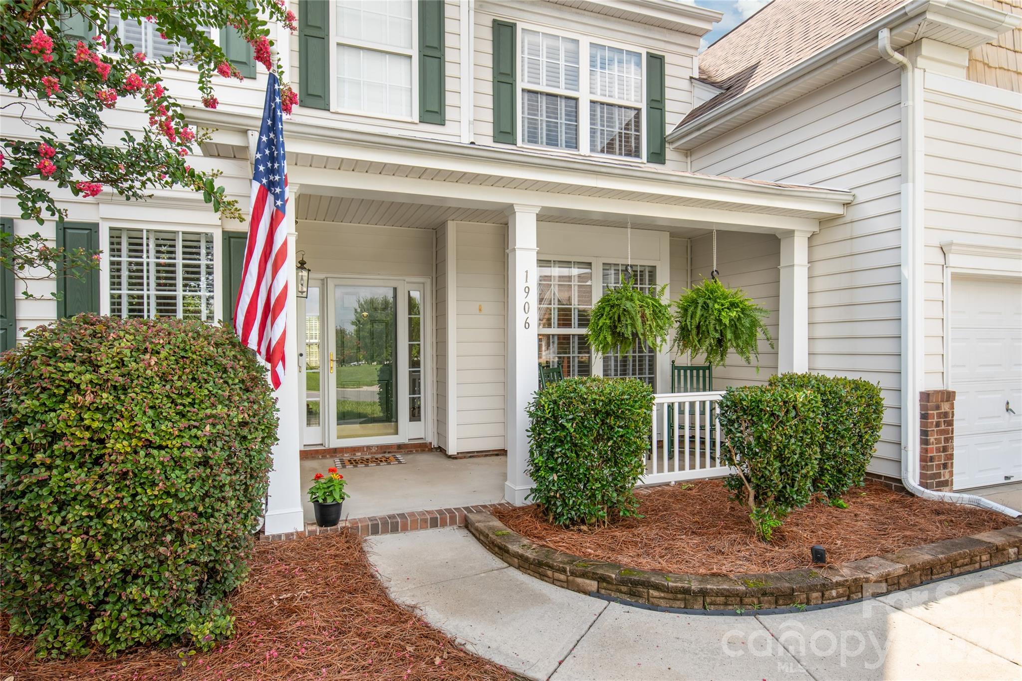 Mature landscaping greets you as you walk up to the covered front porch - 1906 Birchbrook Court, Harrisburg