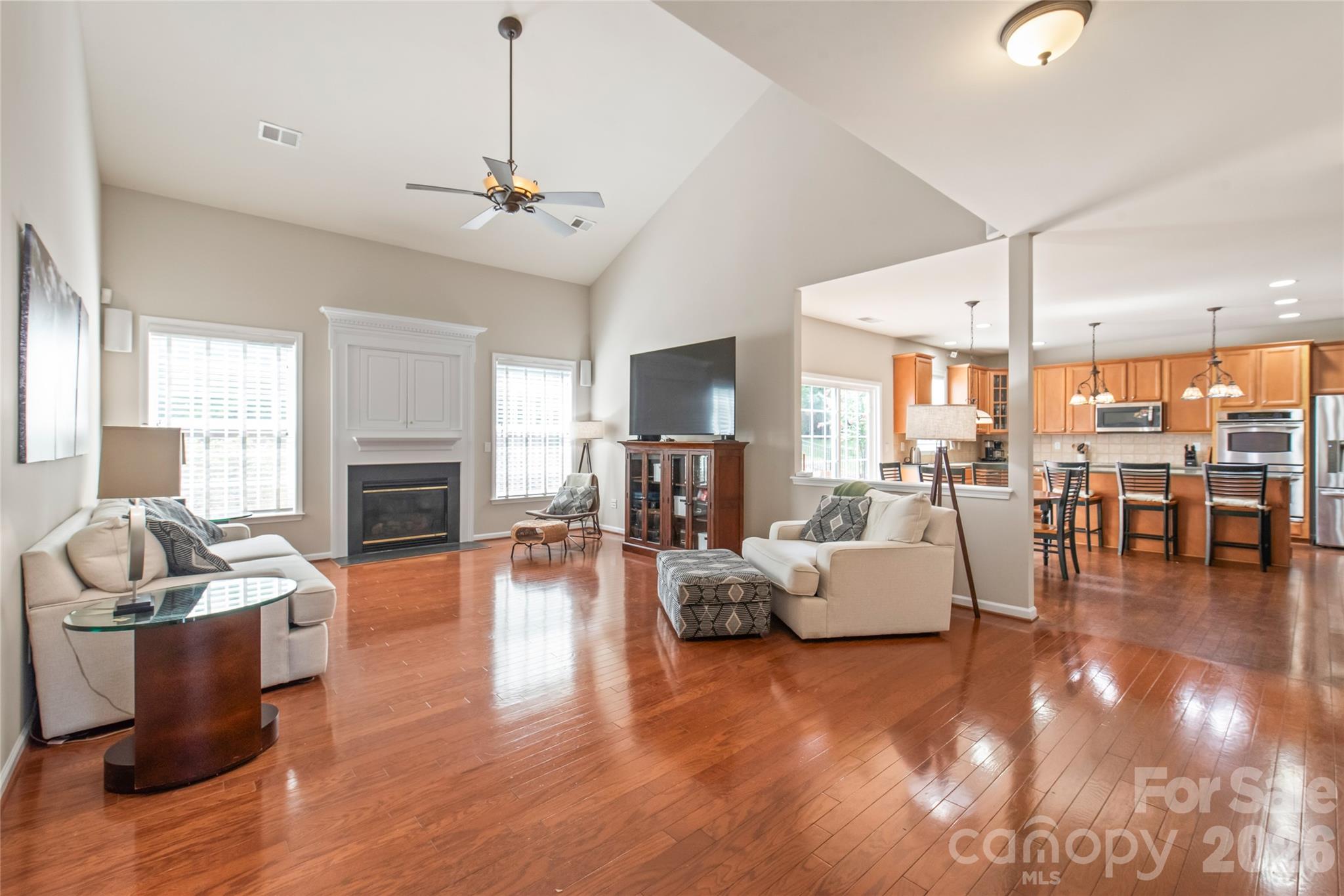 This living room is the perfect heart of the home. Soaring ceilings and open to the Kitchen. It's a great place to gather - 1906 Birchbrook Court, Harrisburg