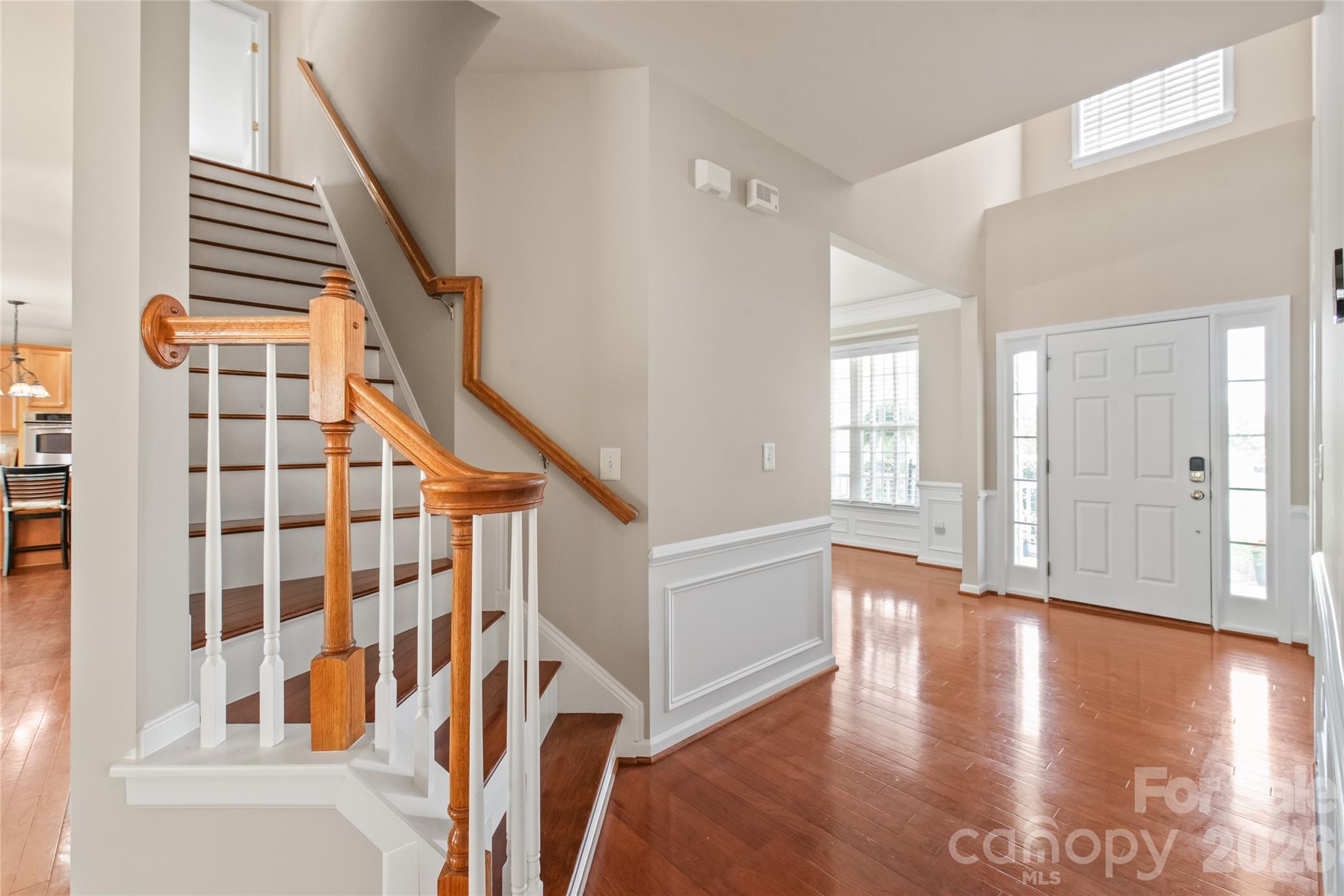 Wide stairs with hardwood tread lead to upper floors - 1906 Birchbrook Court, Harrisburg