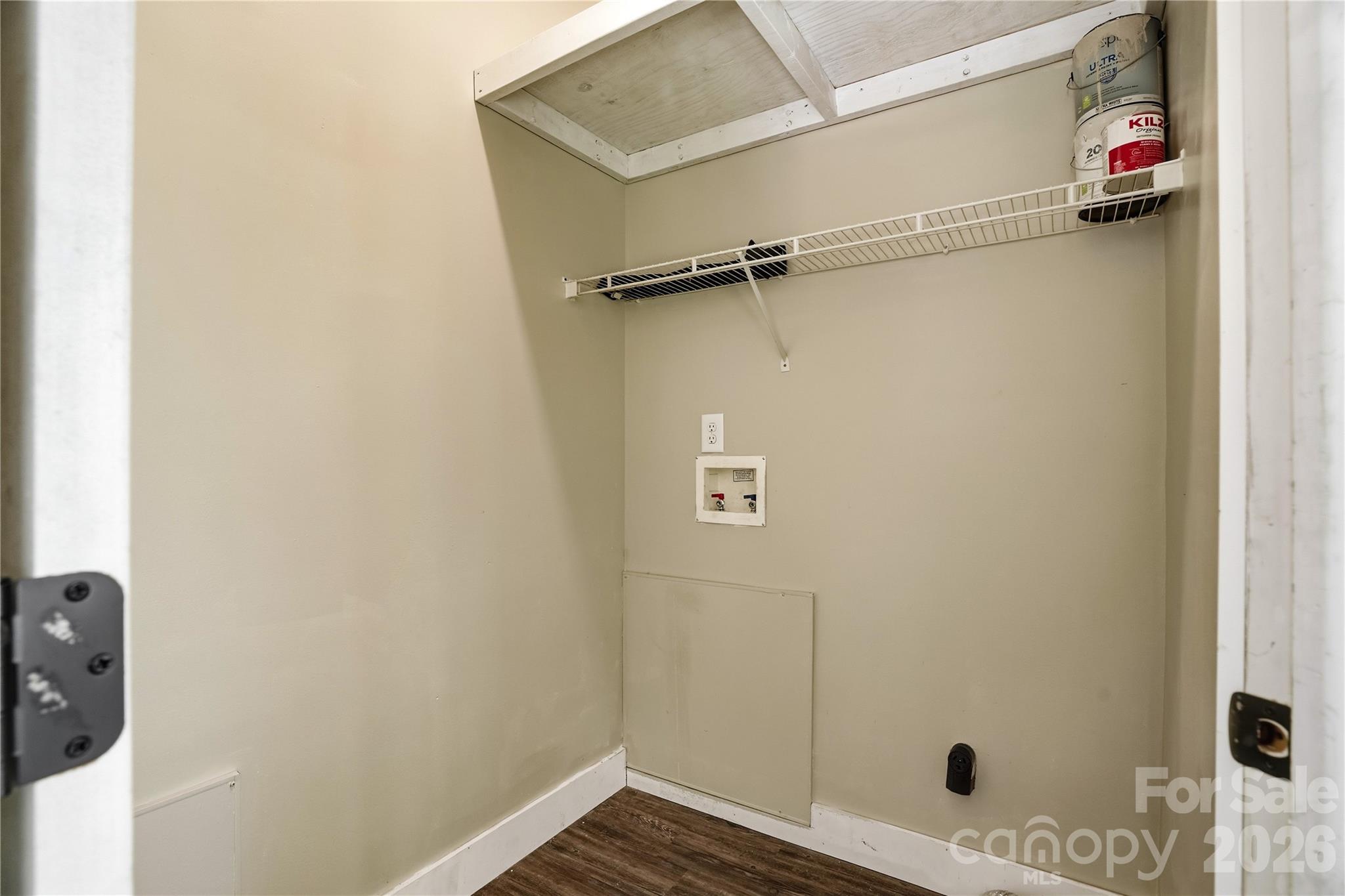 Main floor laundry room with built-in shelves - 3555 Lake Bluff Drive, Sherrills Ford