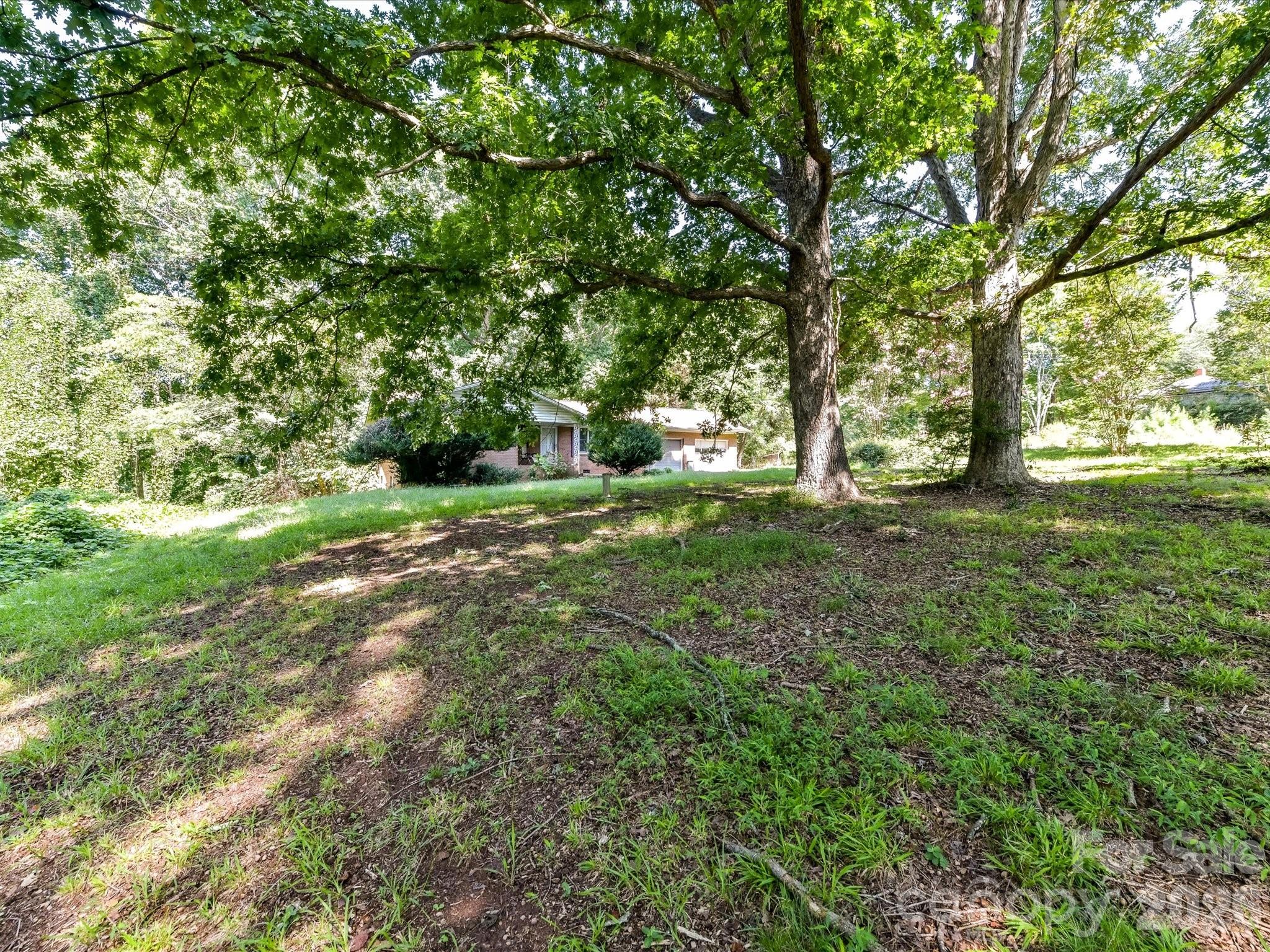 Existing home nestled on a picturesque 3.86-acre parcel now zoned B-N, offering exceptional potential for commercial redevelopment in Denver's rapidly expanding Business Highway 16 corridor. - 1753 N NC Hwy 16 Business Highway, Denver