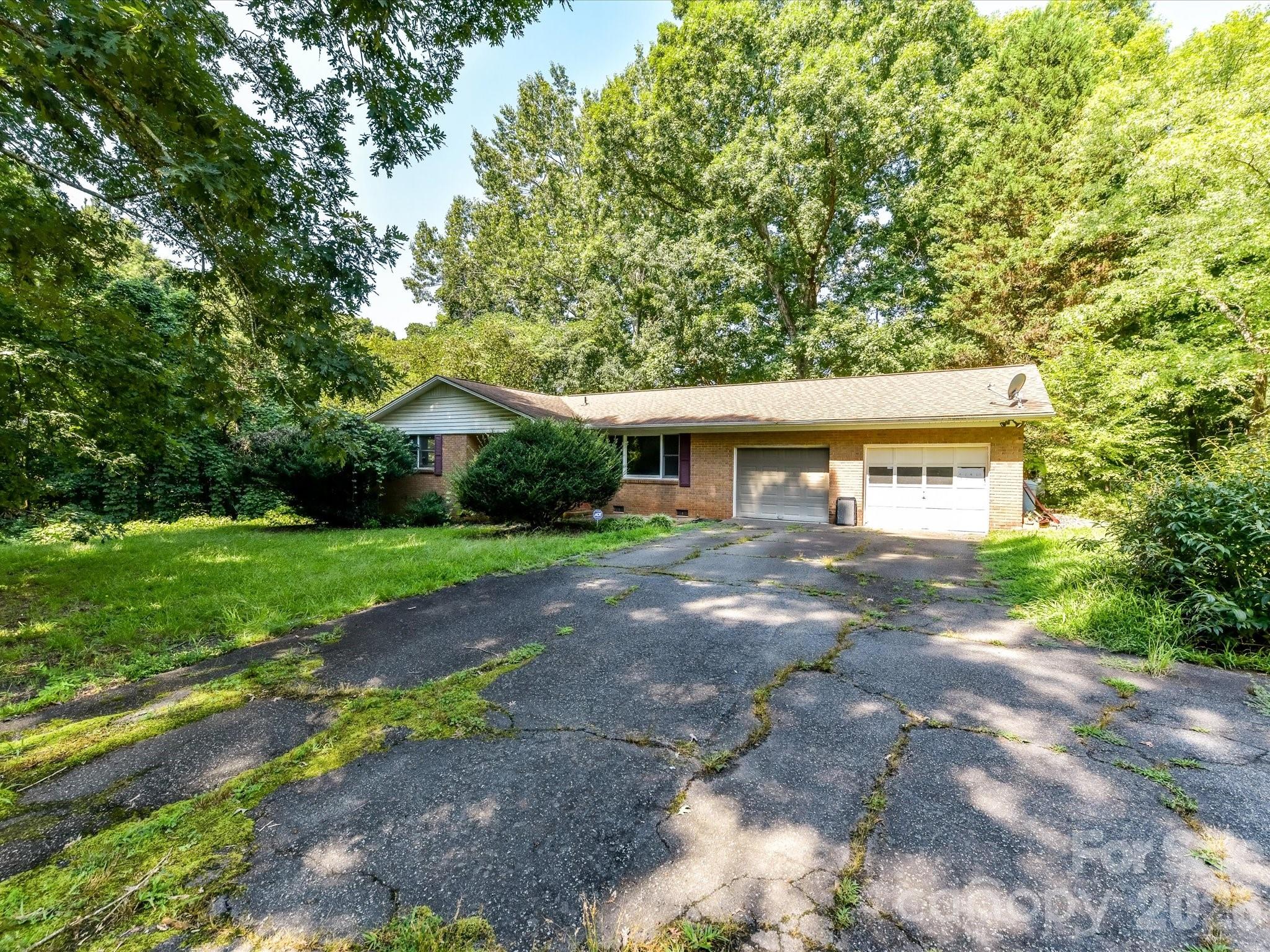 Existing home nestled on a picturesque 3.86-acre parcel now zoned B-N, offering exceptional potential for commercial redevelopment in Denver's rapidly expanding Business Highway 16 corridor. - 1753 N NC Hwy 16 Business Highway, Denver