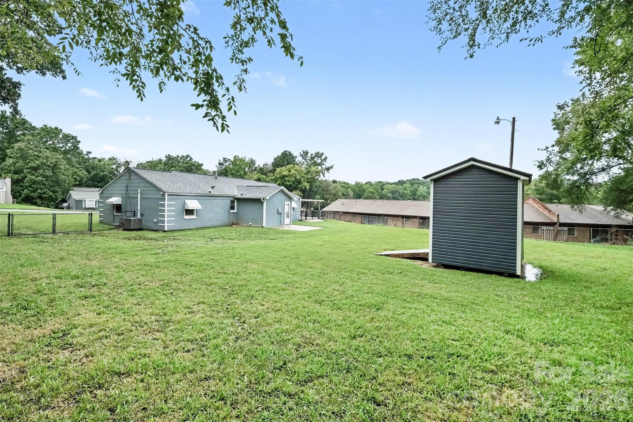 Backyard with storage shed - 1352 Steed Street, Rock Hill