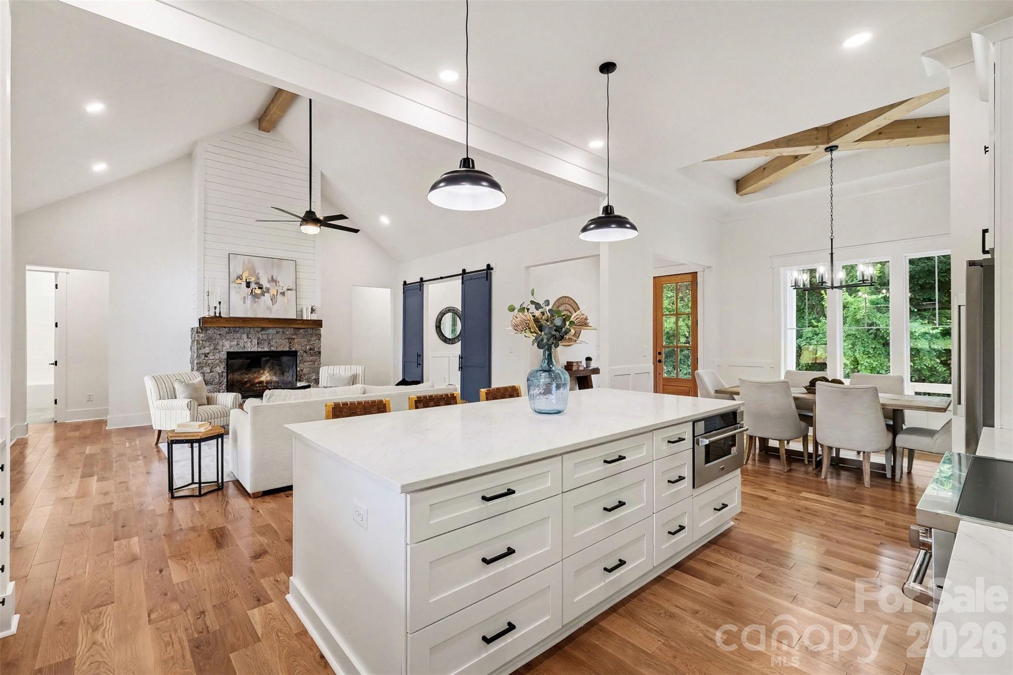 With a GIANT quartz island with TONS of pot drawers. - 6609 McNeely Road, Waxhaw