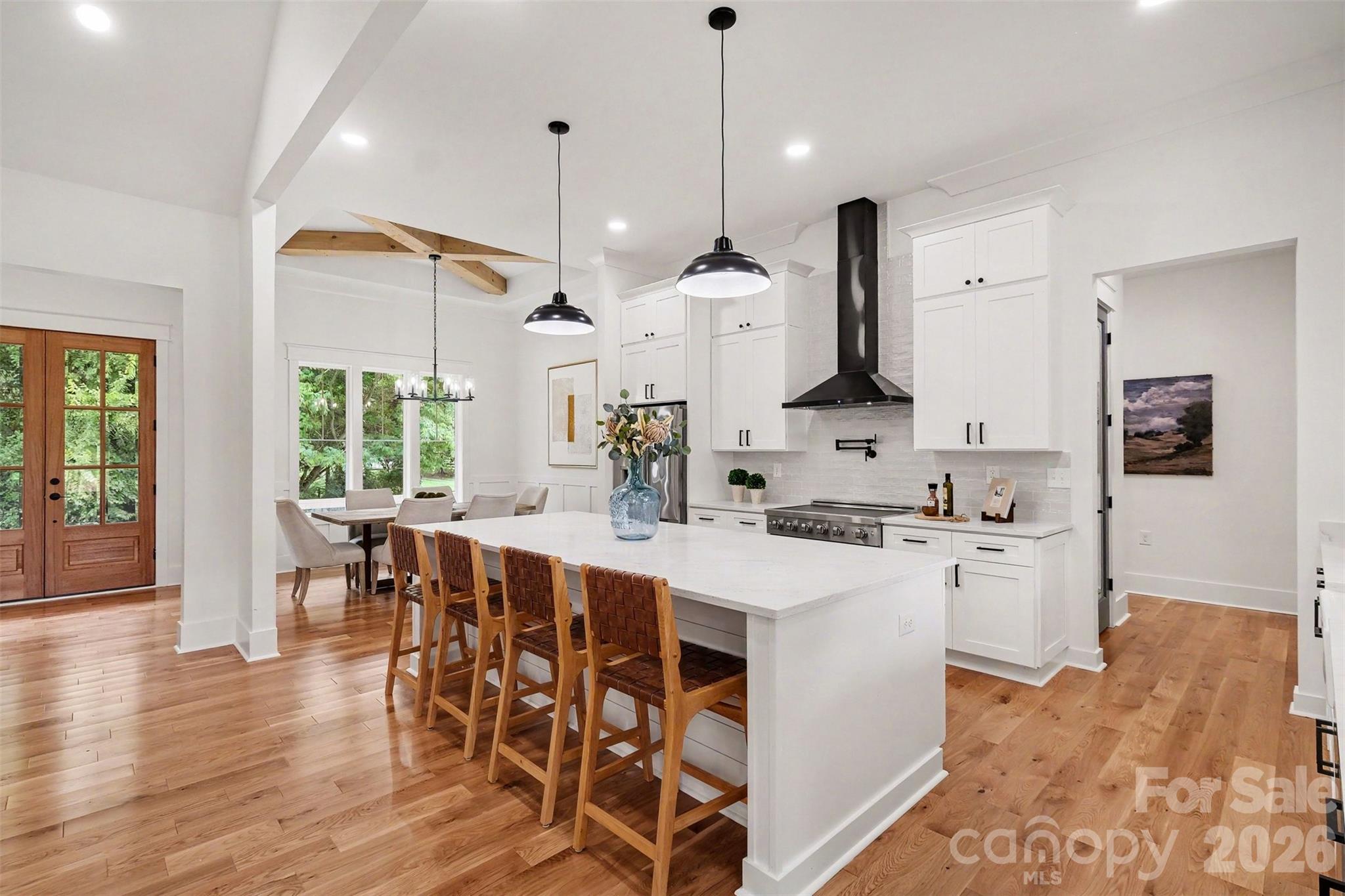 ALL your friends will gather around that big island. And the kiddos can have breakfast there, too. - 6609 McNeely Road, Waxhaw
