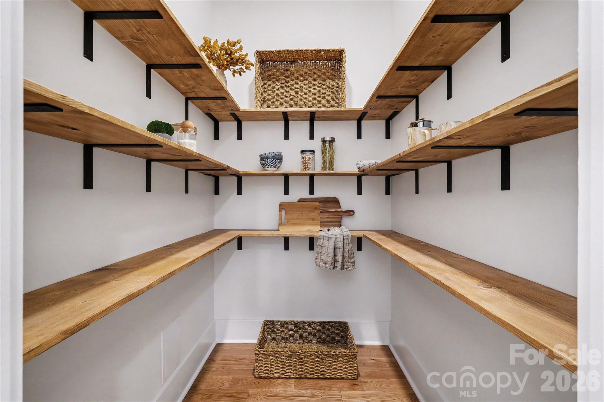 ALL the stuff -- even after a Costco run -- fits in your new walk-in pantry. - 6609 McNeely Road, Waxhaw