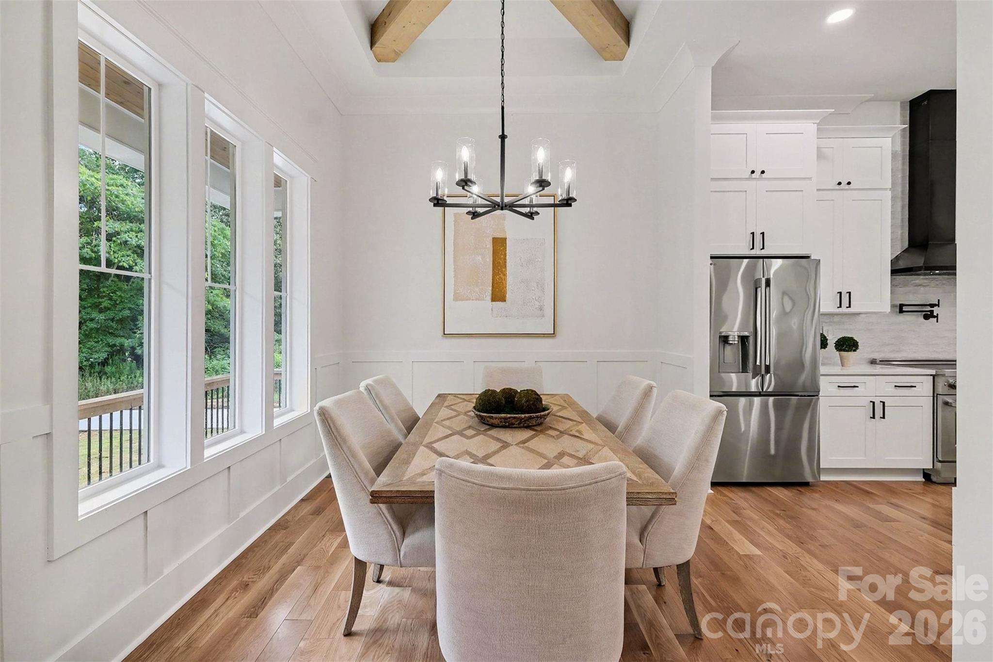 You'll love hosting dinner parties in your new 12x10 dining room with the coolest cedar beam accent you've ever seen. - 6609 McNeely Road, Waxhaw