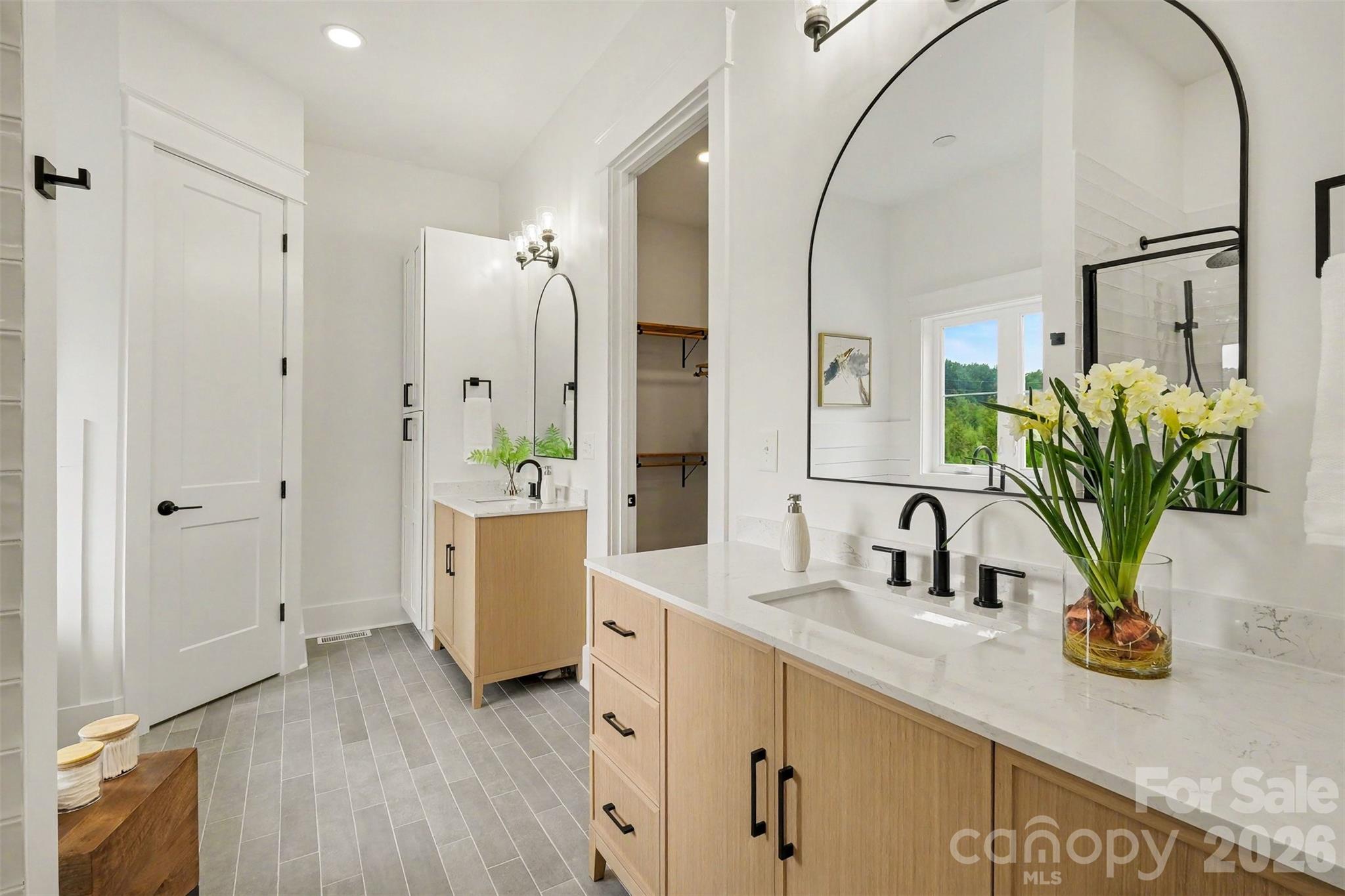 And split his-and-her vanities. And linen closet. - 6609 McNeely Road, Waxhaw