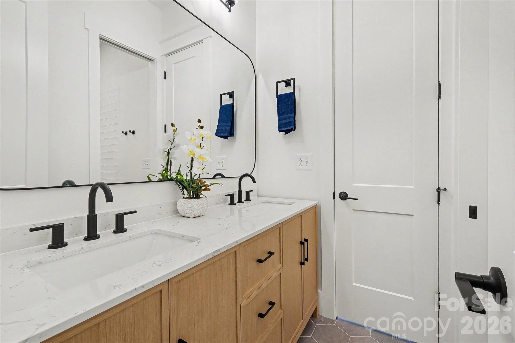 The kids will love their Jack-and-Jill bathroom with double vanity. - 6609 McNeely Road, Waxhaw