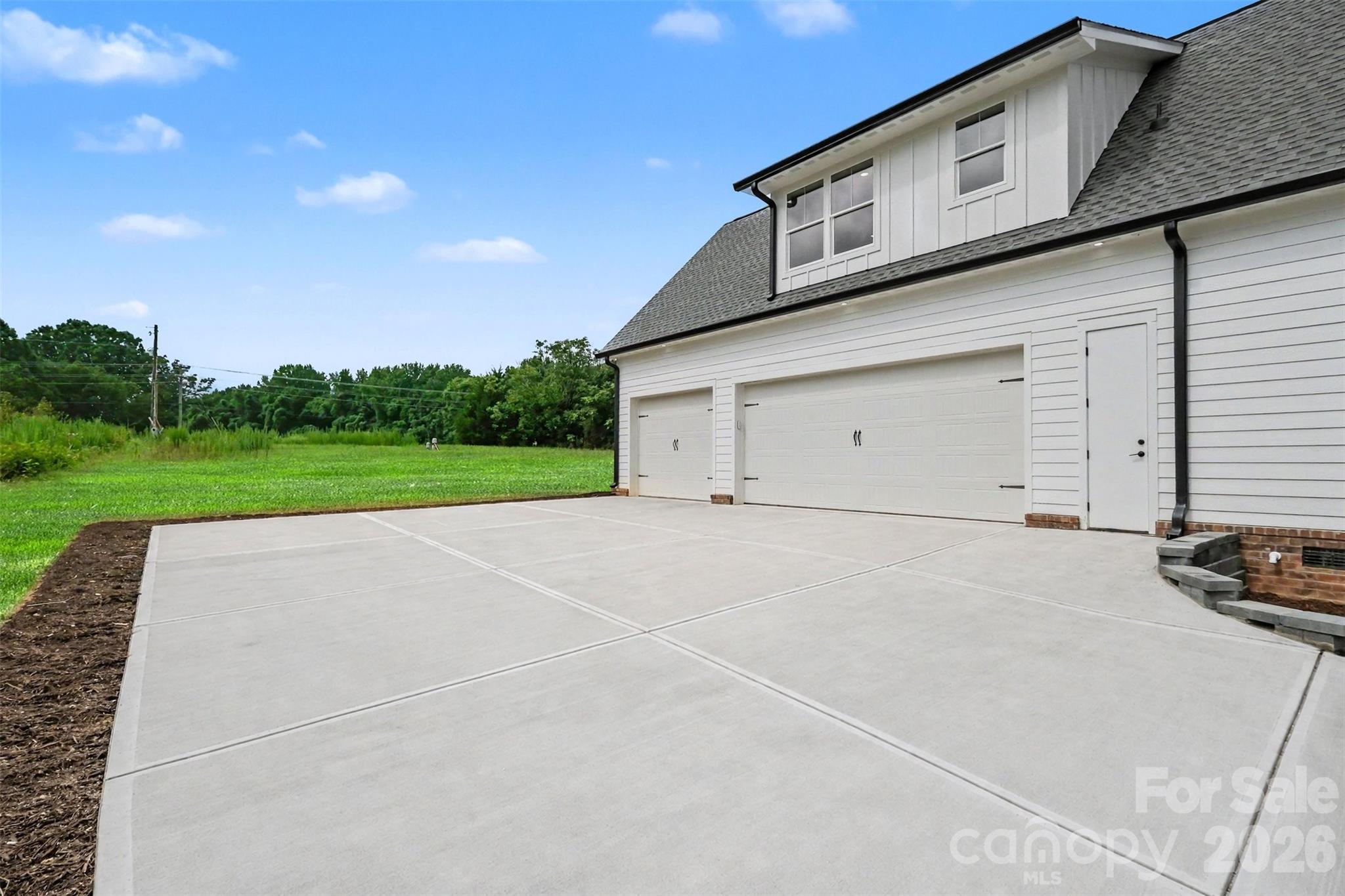 And your driveway pad is plenty big enough for an awesome basketball court. - 6609 McNeely Road, Waxhaw