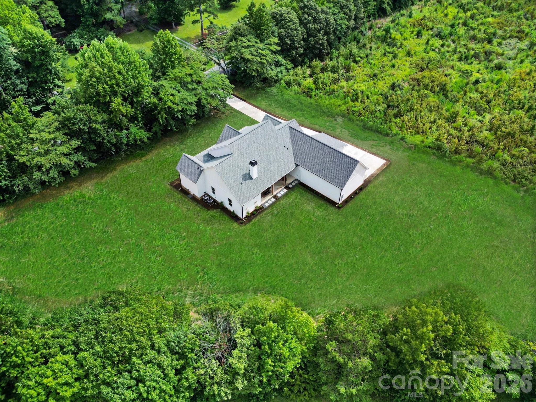Definitely room for a swimming pool and a pickleball court and a vegetable garden, a putting green and much more. - 6609 McNeely Road, Waxhaw