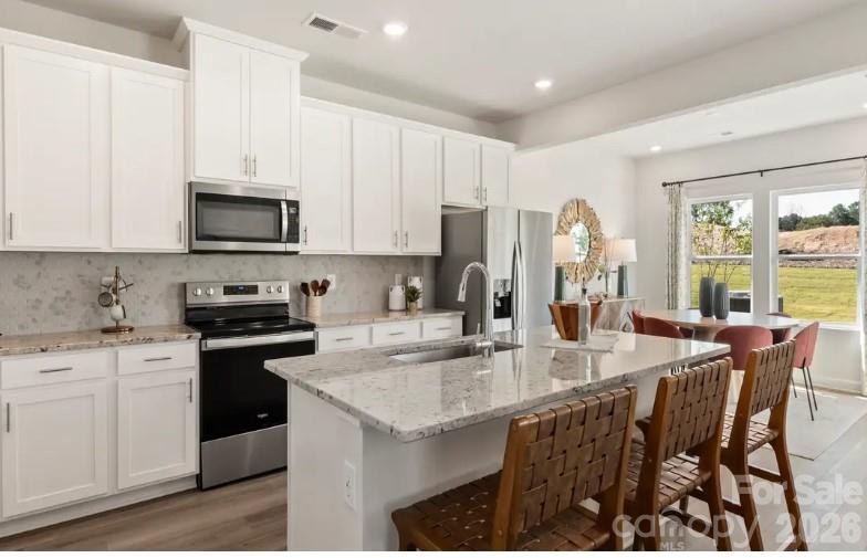 Photo is not of the actual home, but is an inspirational photo of builder’s model home and may depict options, furnishings, and/or decorator features that are not included - 2618 Celestial Drive, Newton