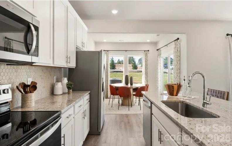 Photo is not of the actual home, but is an inspirational photo of builder’s model home and may depict options, furnishings, and/or decorator features that are not included - 2618 Celestial Drive, Newton