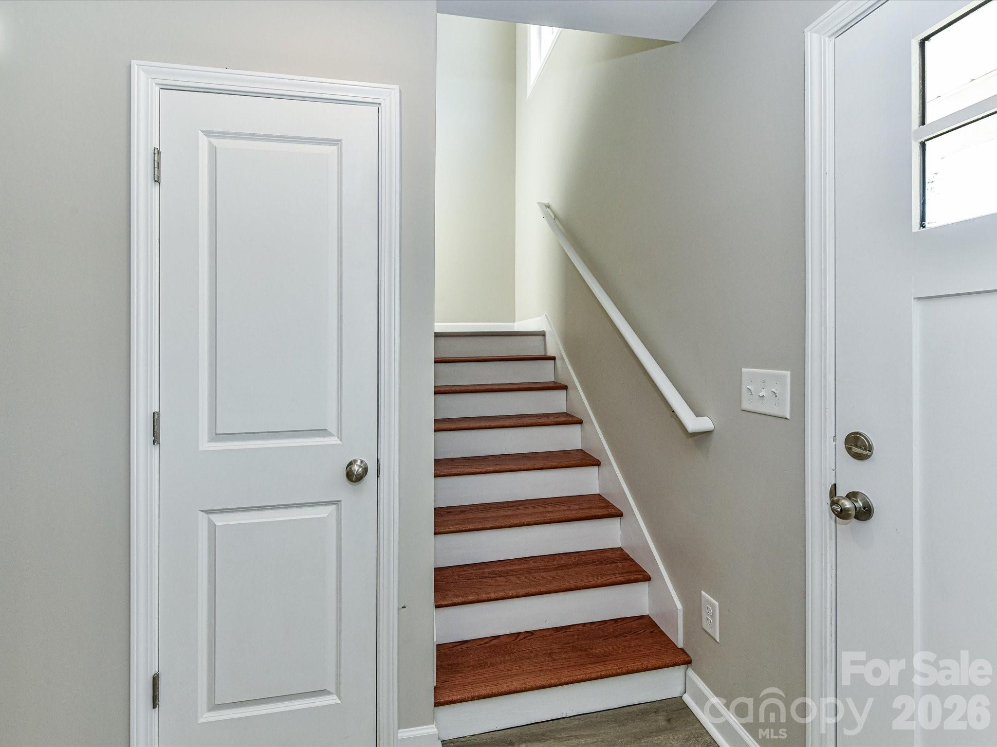 Stairs & Coat Closet near Front Door - 550 Claymon Road, Oakboro