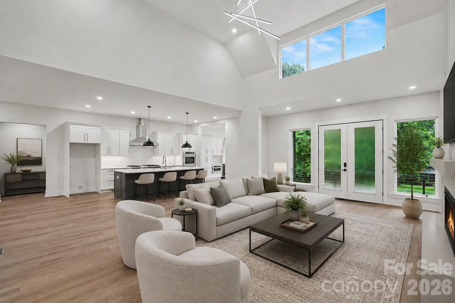 Living room into kitchen-virtually staged - 4808 Rockwood Drive, Waxhaw