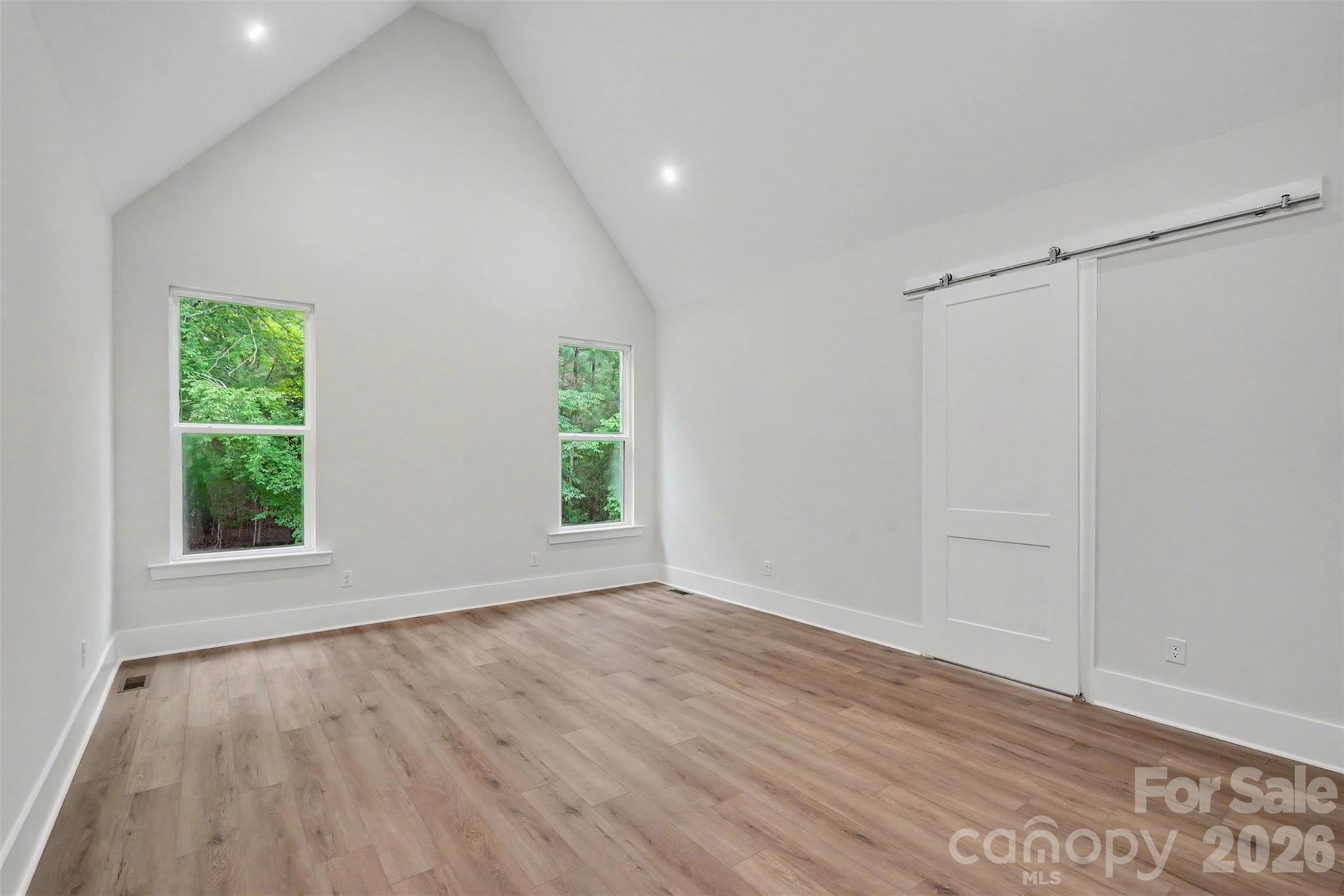 Primary Bedroom with vaulted ceiling - - 4808 Rockwood Drive, Waxhaw