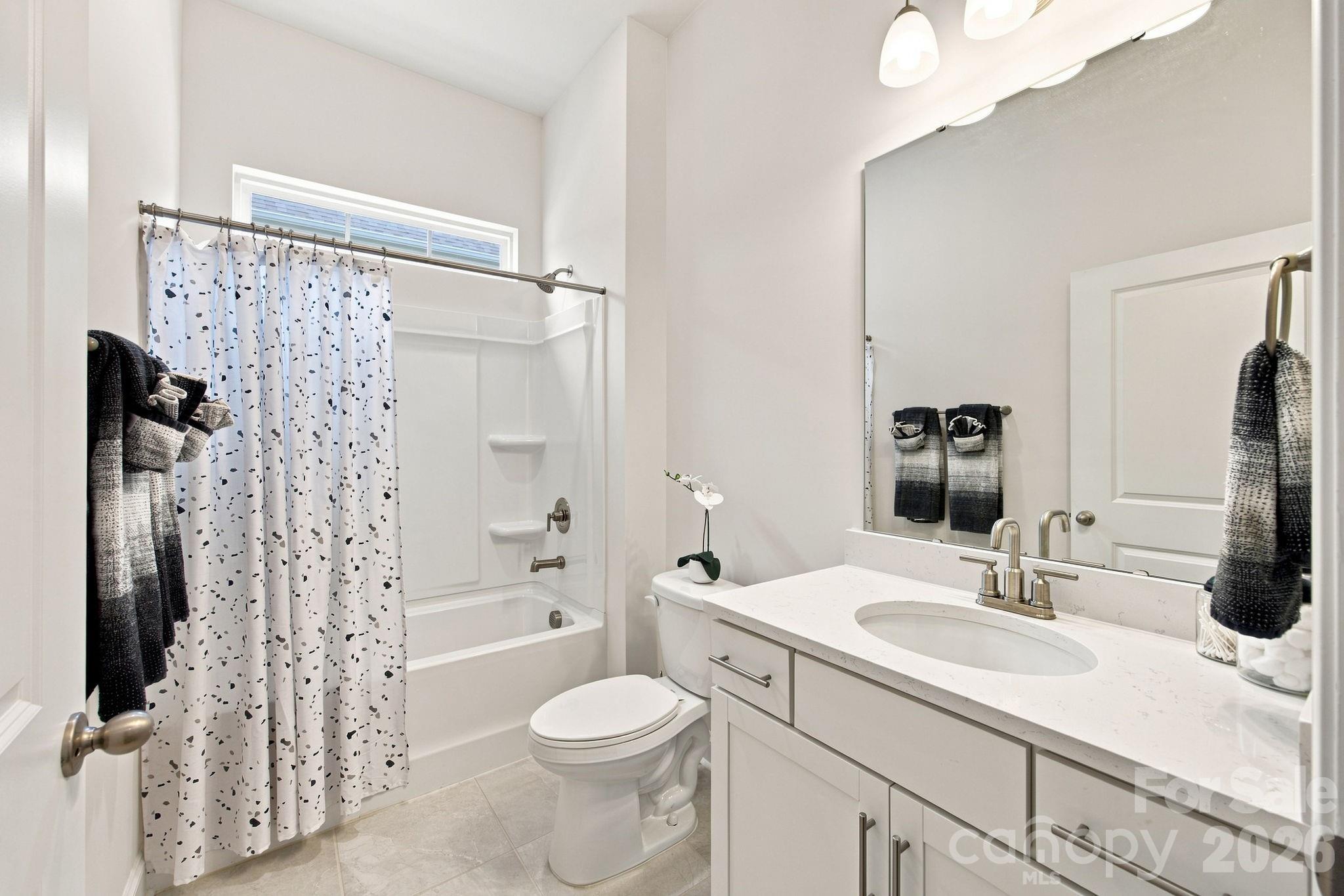 First floor guest bathroom - 8125 Warford Little Road, Denver