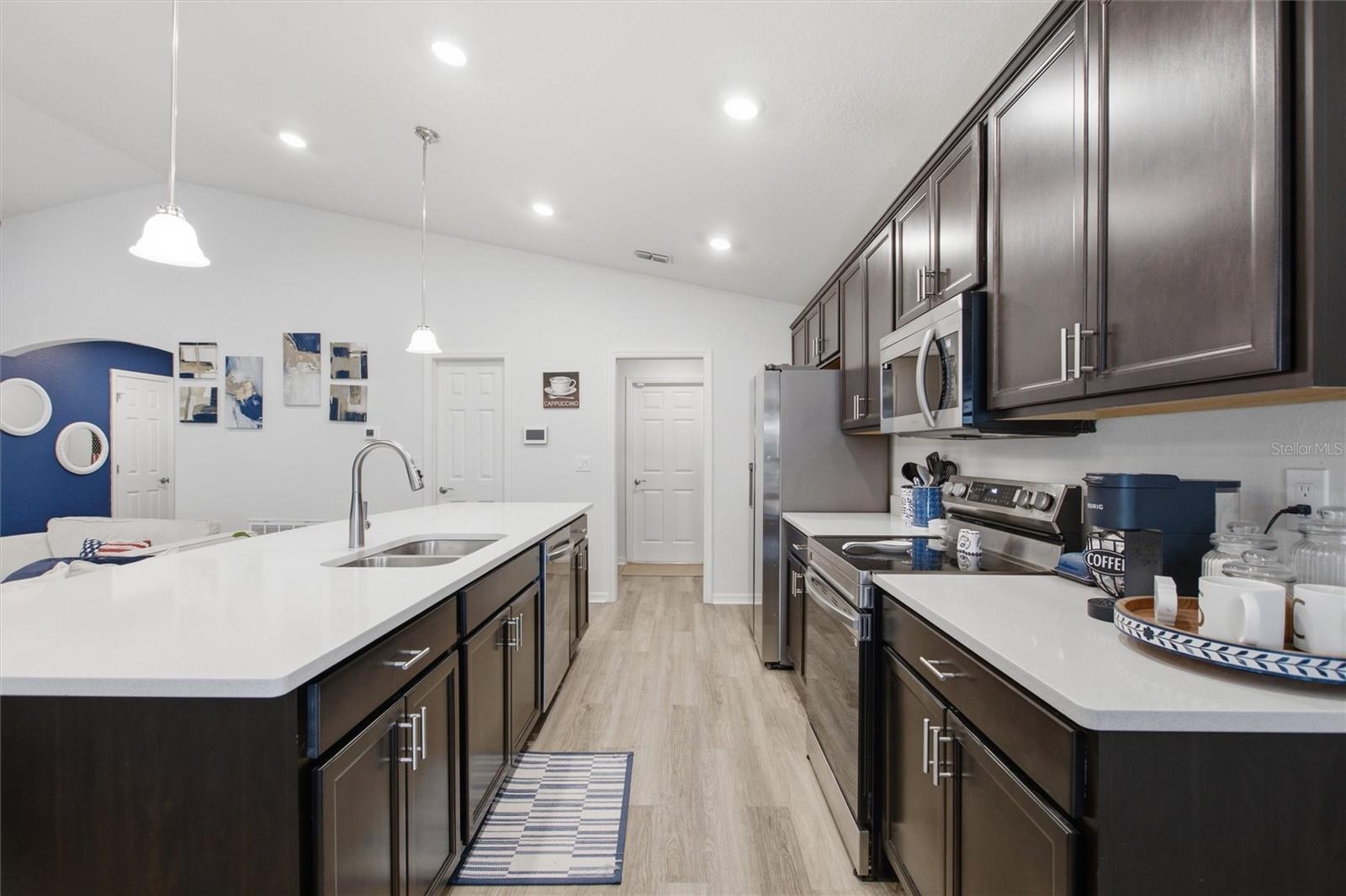 Luxury Kitchen with Silestone Counters and Espresso Cabinets - 2295 SUNSET WAY, DAVENPORT