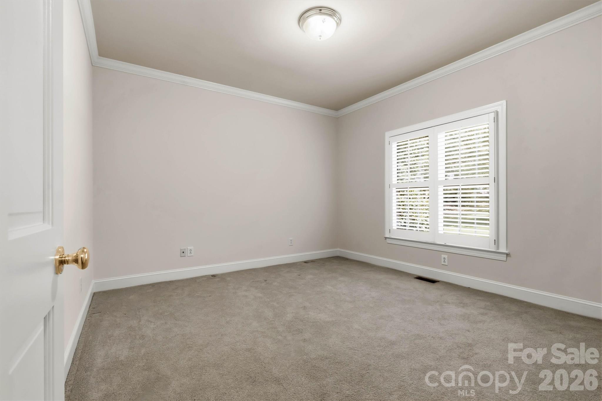 Third bedroom on the main level. All rooms are large with plenty of space to decorate - 675 Heather Drive, Lincolnton