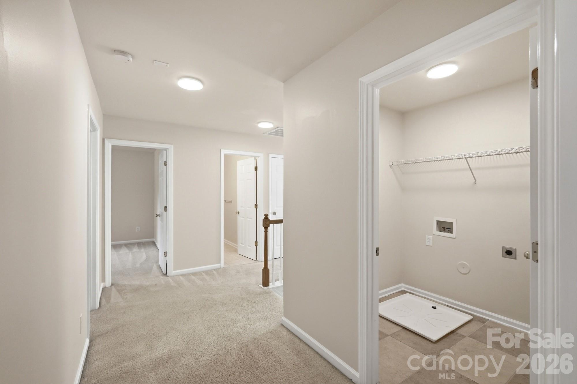 Hallway and upstairs laundry - 125 Morrocroft Lane, Mooresville