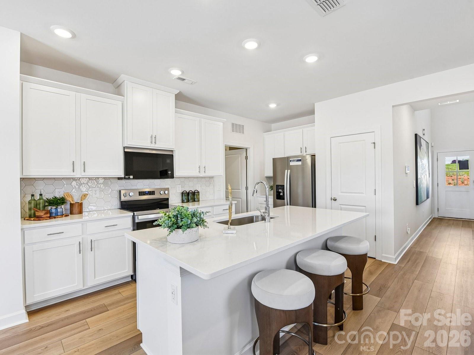 Photo is not of the actual home, but is an inspirational photo of builder’s model home and may depict options, furnishings, and/or decorator features that are not included - 3050 14th Avenue NE, Conover
