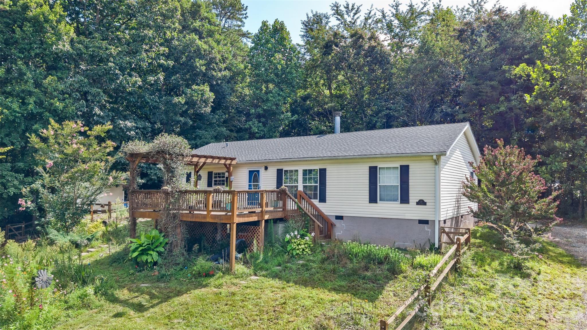 Closer view of the front of the house, highlighting large dek - 25 Asa Court, Black Mountain