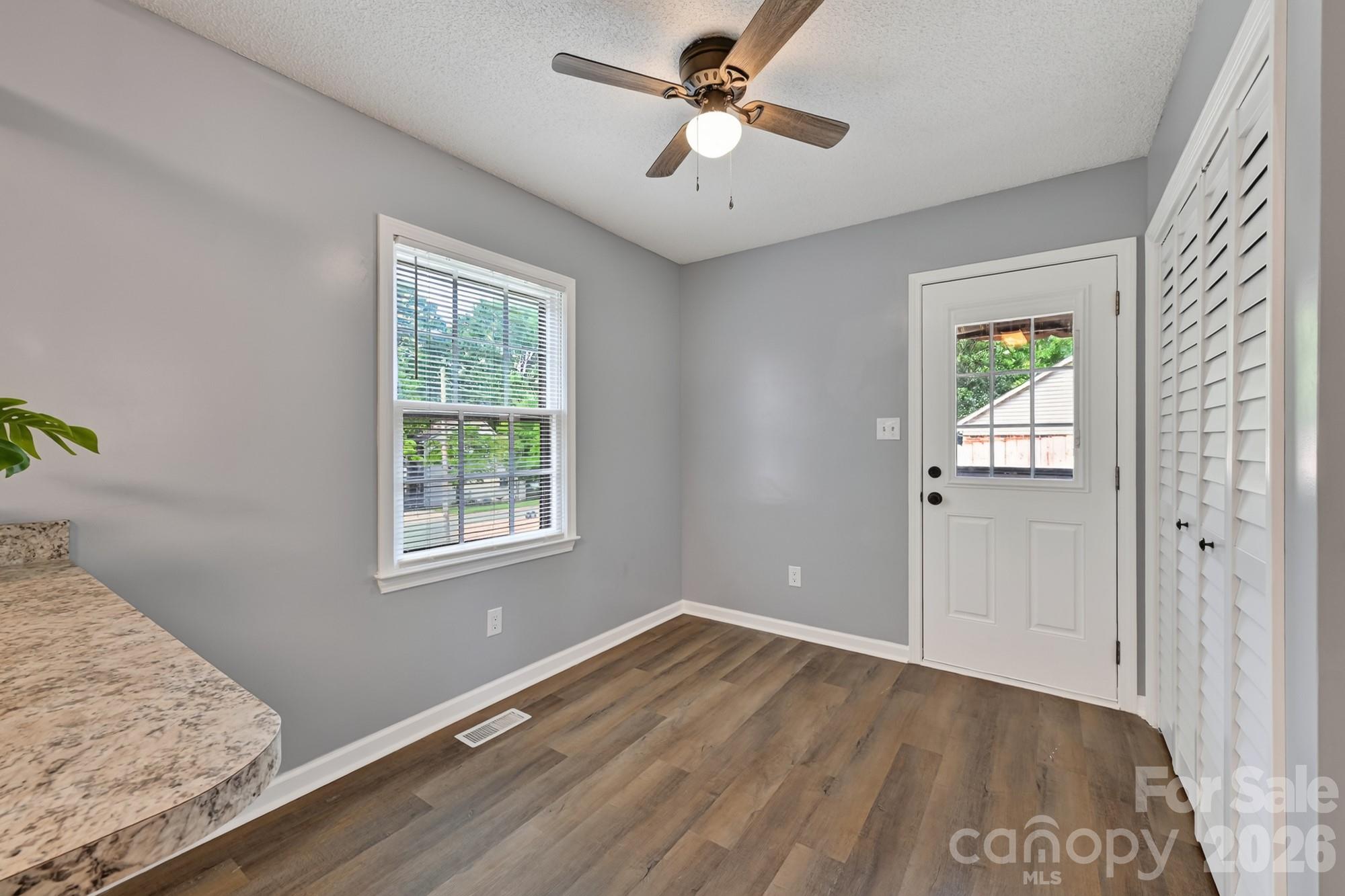Breakfast area and laundry off the kitchen - 1620 Windyrush Lane, Gastonia
