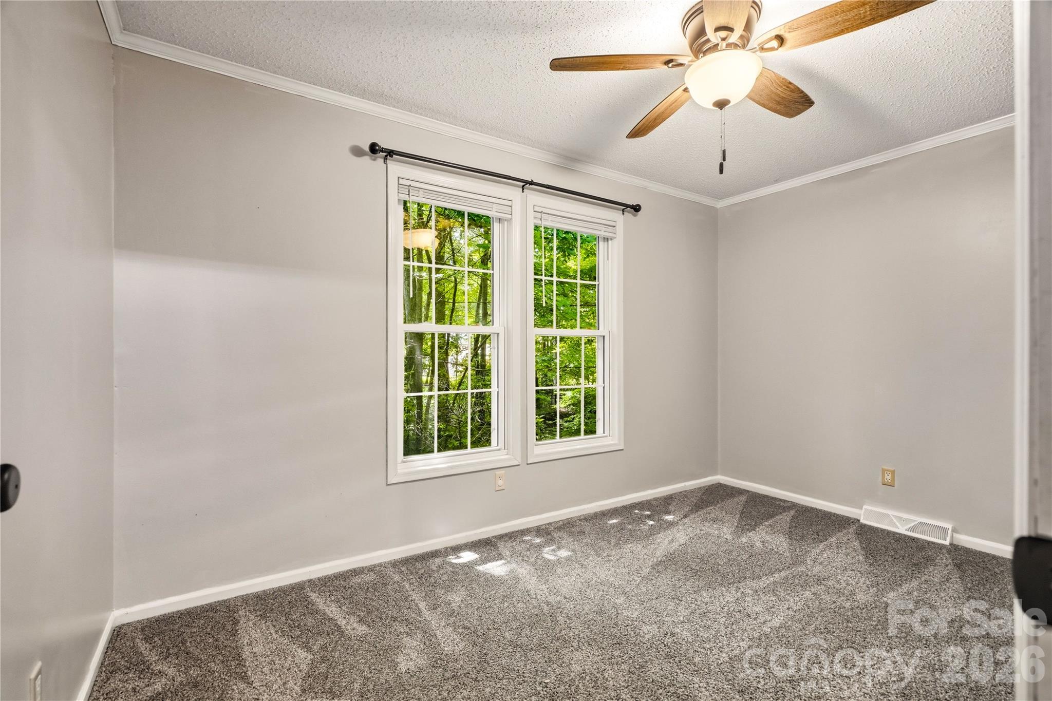 Second bedroom with ceiling fan - 3555 Lake Bluff Drive, Sherrills Ford