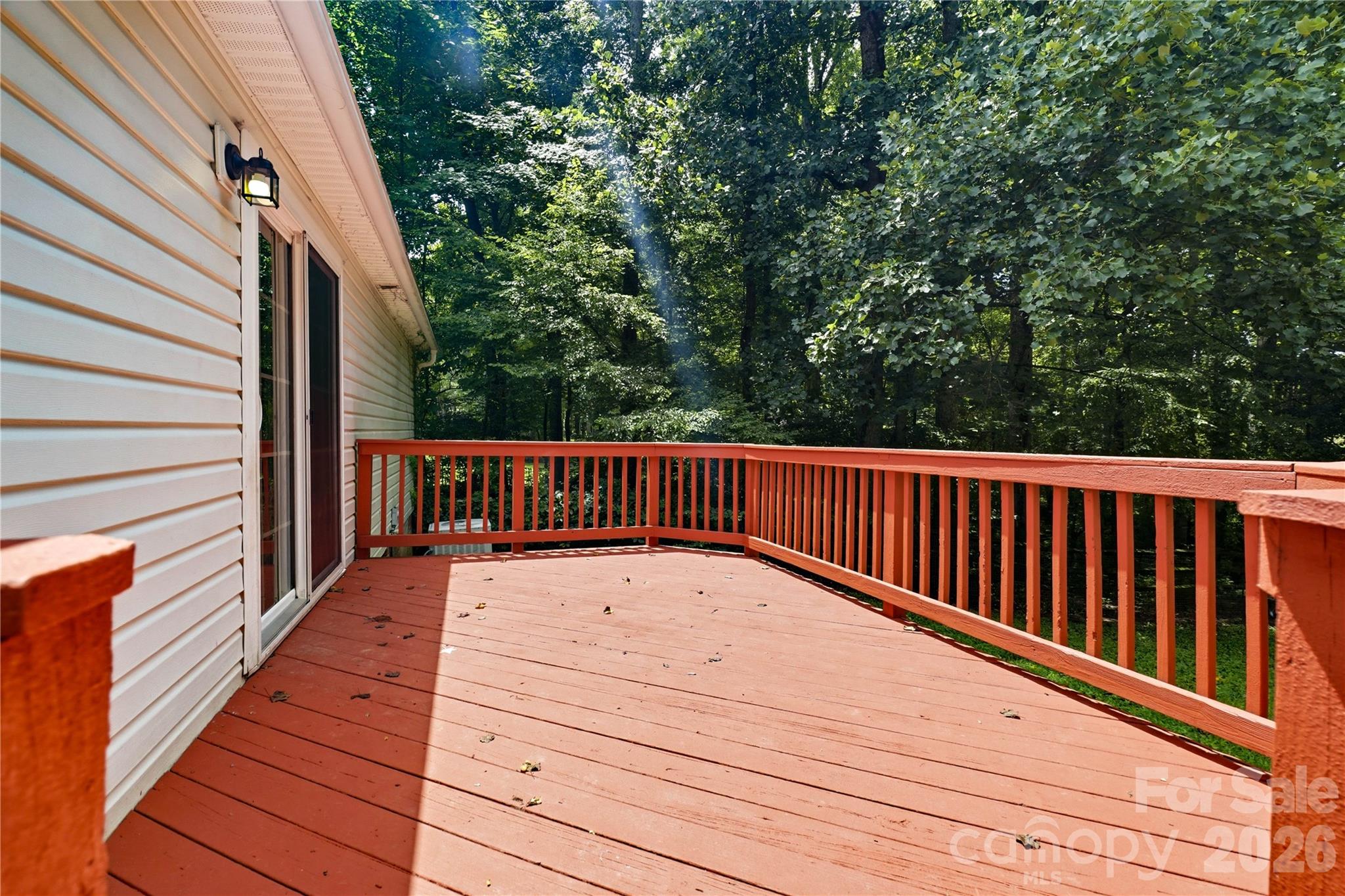 Freshly painted deck off sliding doors from house - 3555 Lake Bluff Drive, Sherrills Ford