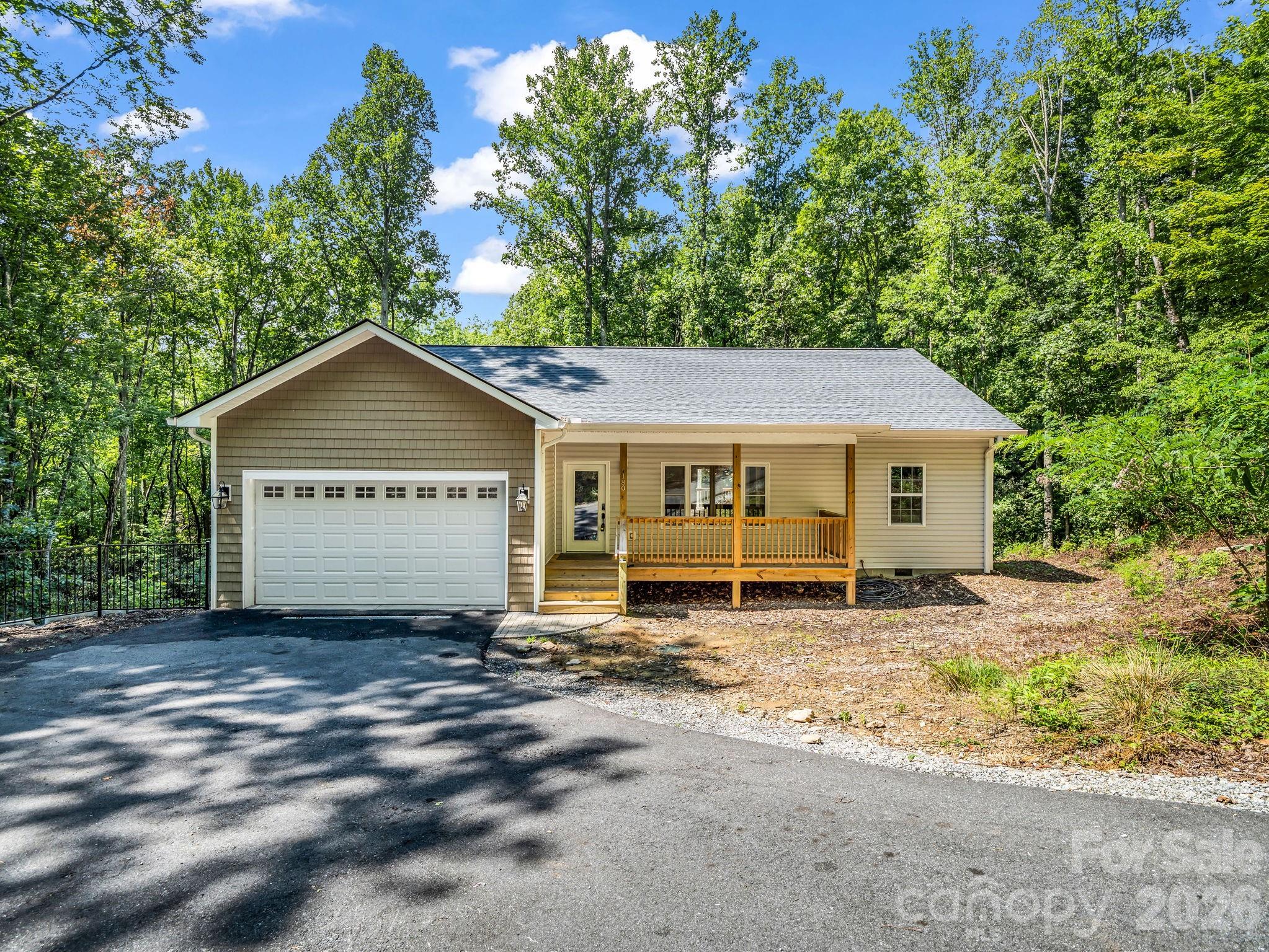 Private location surrounded by trees. - 180 Ridgeview Drive, Hendersonville