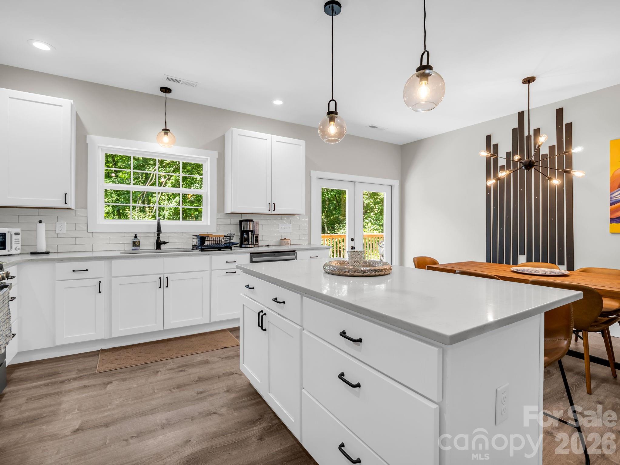 Plenty of cupboards, cabinets and drawers for storage. - 180 Ridgeview Drive, Hendersonville