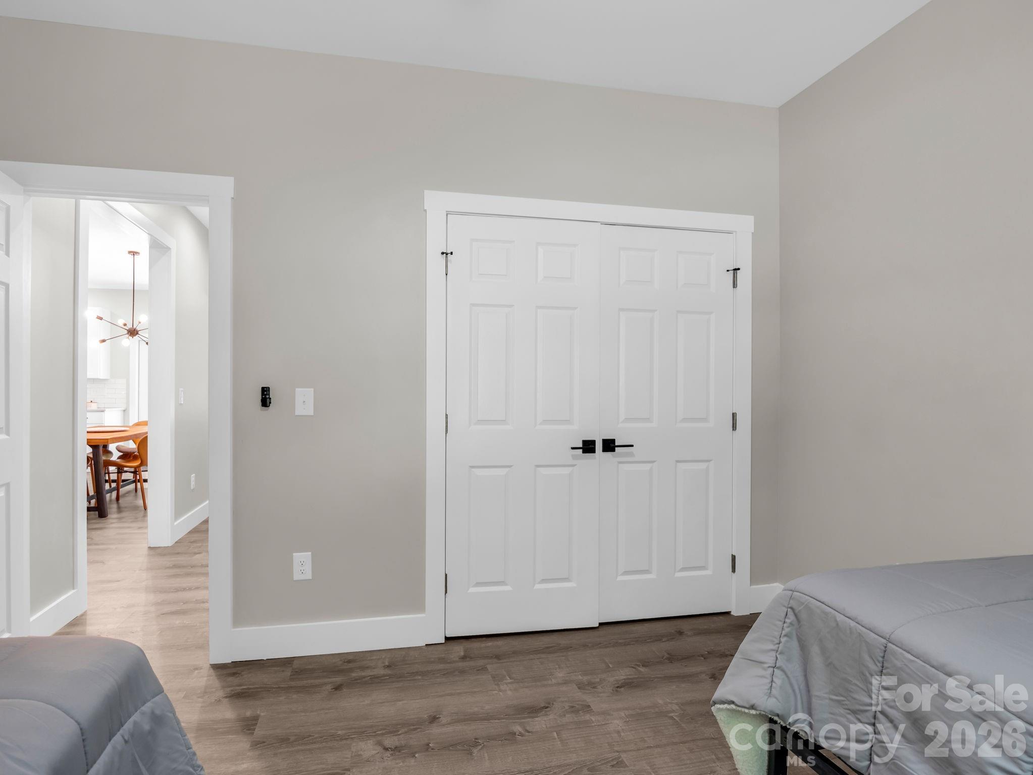 Guest bedroom 1 looking back toward the hallway. - 180 Ridgeview Drive, Hendersonville