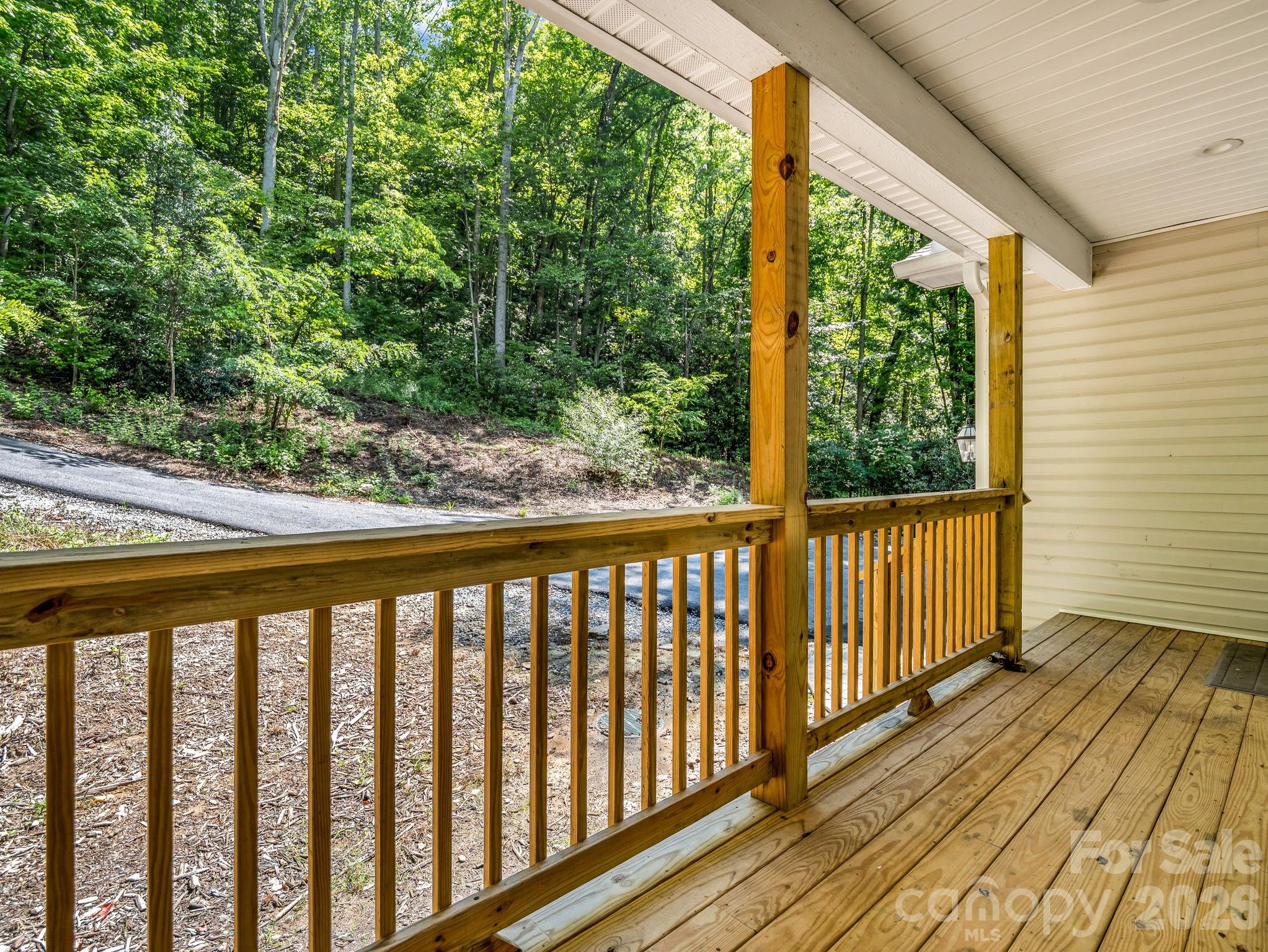 Front porch, garage entrance is to the right. - 180 Ridgeview Drive, Hendersonville