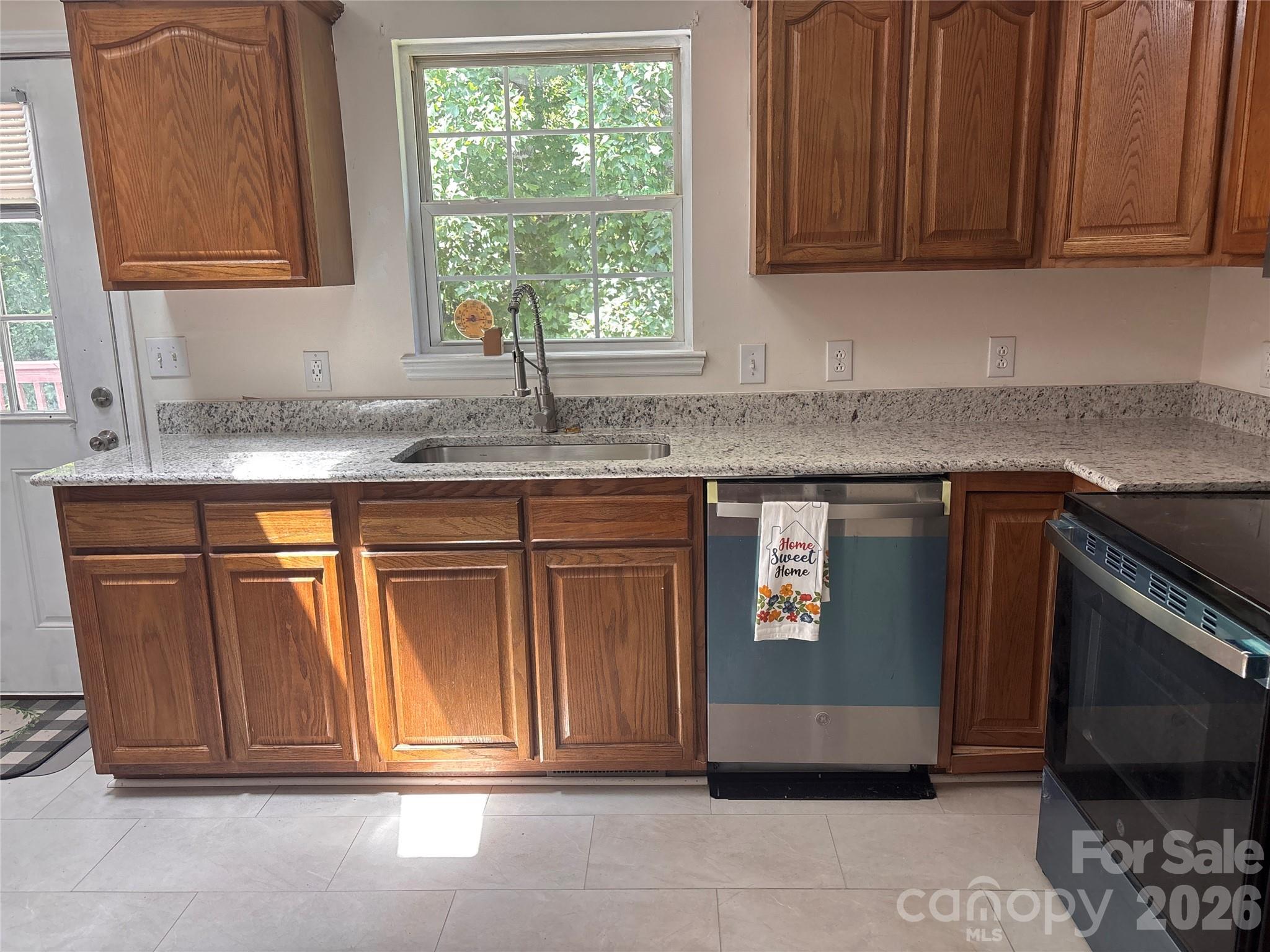 New granite countertop and deep kitchen sink with pull down spout - 5164 Ralph Winchester Road, Lenoir