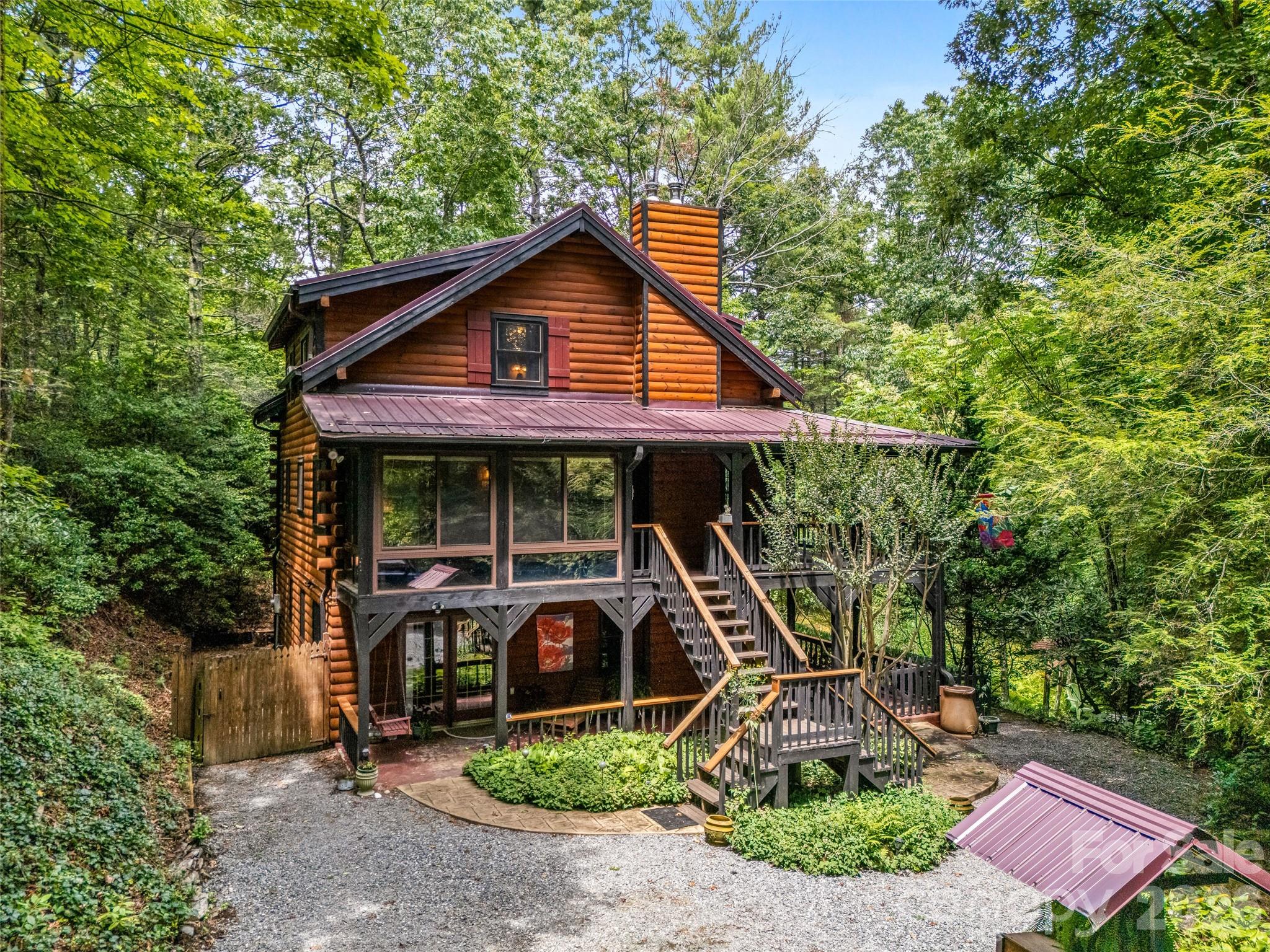Ample parking on the gravel pad - 696 Top Of The Mountain Road, Hendersonville
