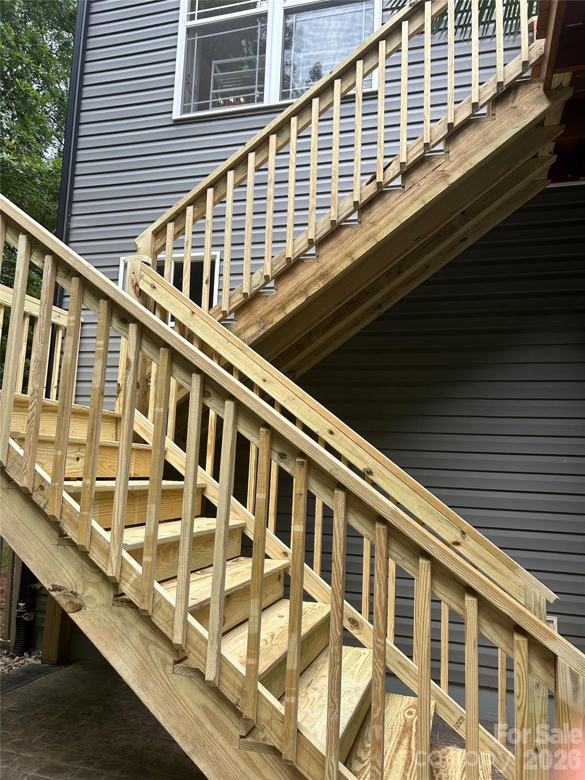 New deck stairs - 155 Wood Acre Drive, Mooresville