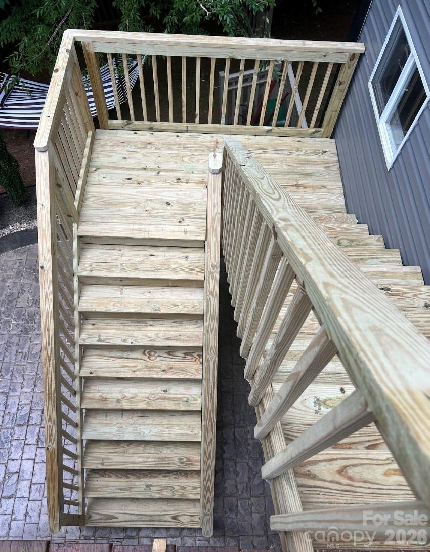 Newly permitted deck stairs to patio from deck - 155 Wood Acre Drive, Mooresville