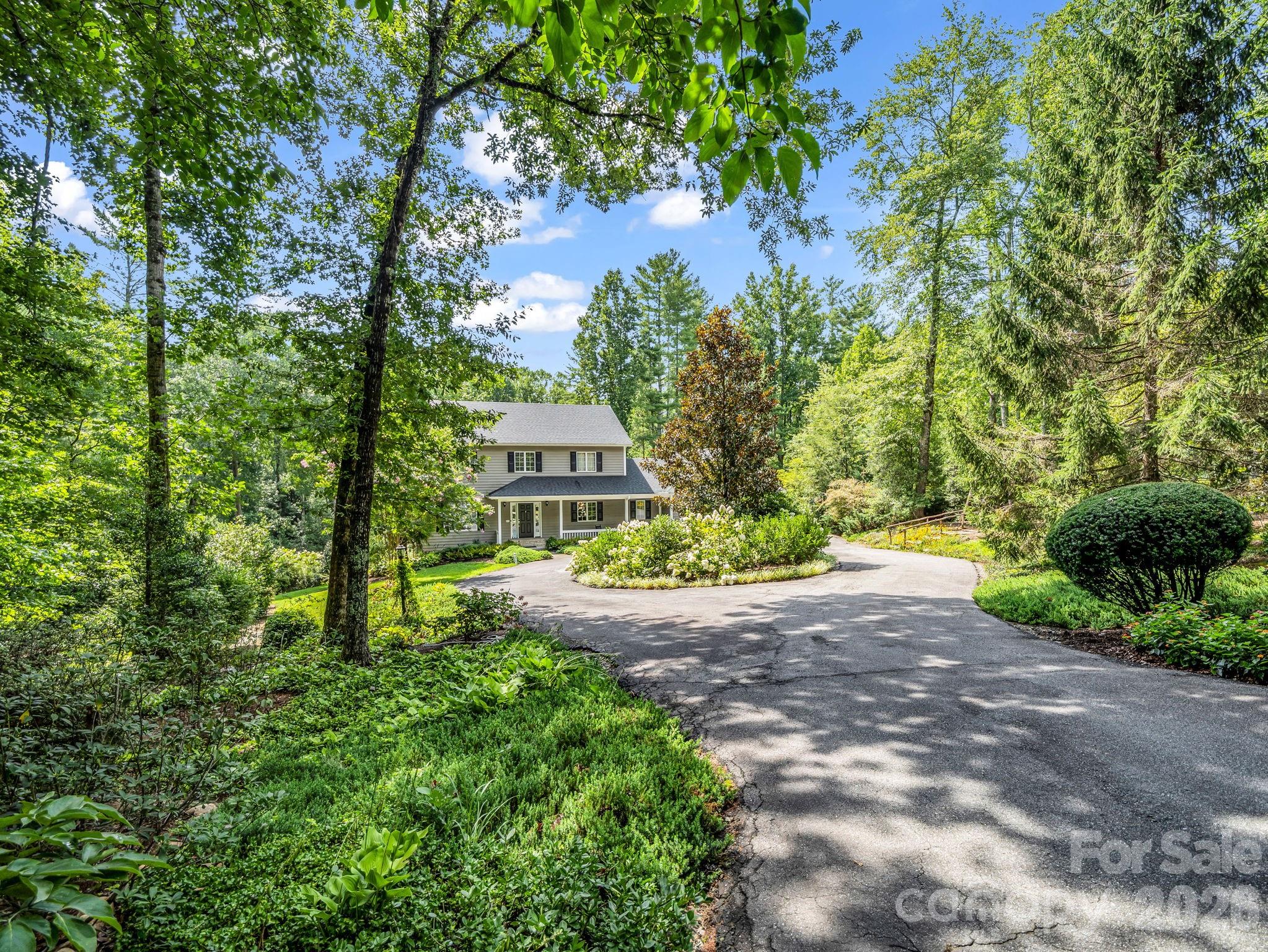 Nestled in the woods - 15 Ravenwood Drive, Fletcher