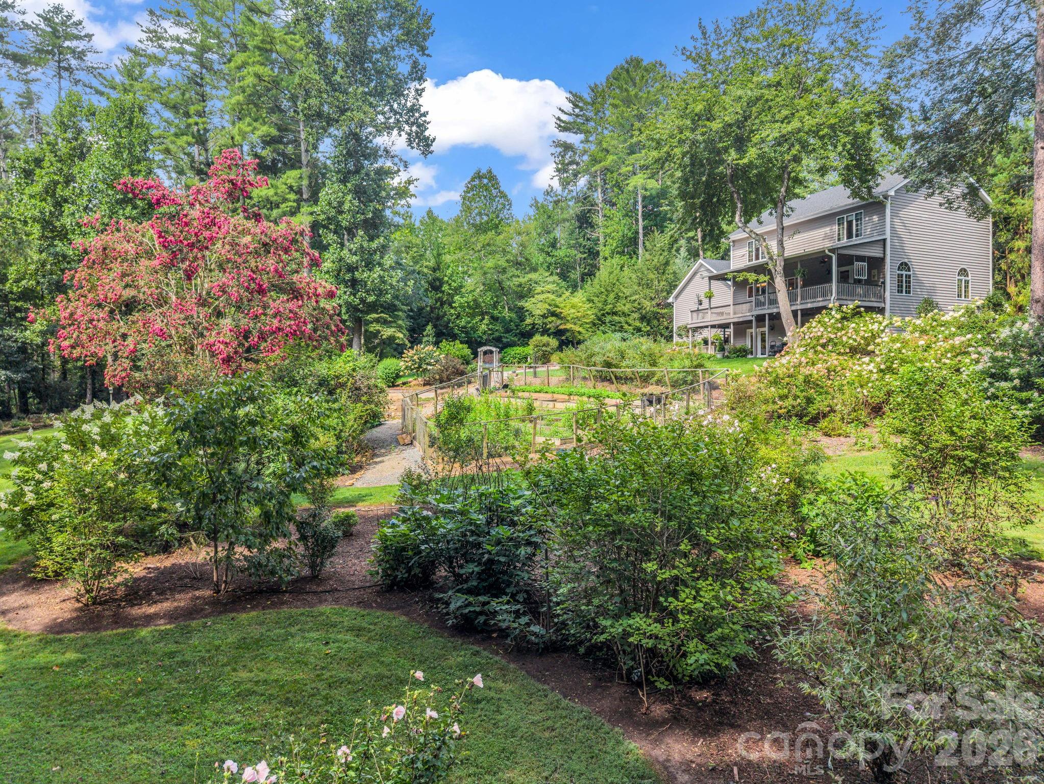 Park like setting back yard. Your green thumb will love it! - 15 Ravenwood Drive, Fletcher