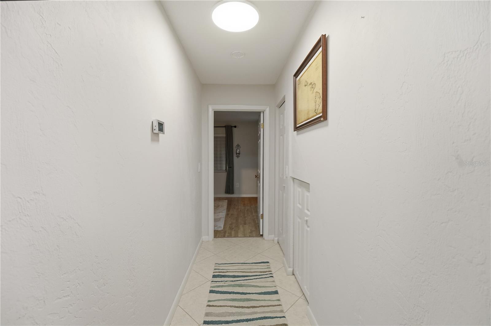 Downstairs Hallway - 56 LAKE FOREST PL, PALM COAST