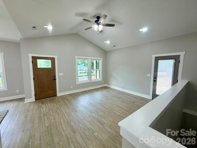 Front door with beech colored stain, vaulted ceilings, LVP flooring - 1135 Pinebrook Avenue SE, Valdese