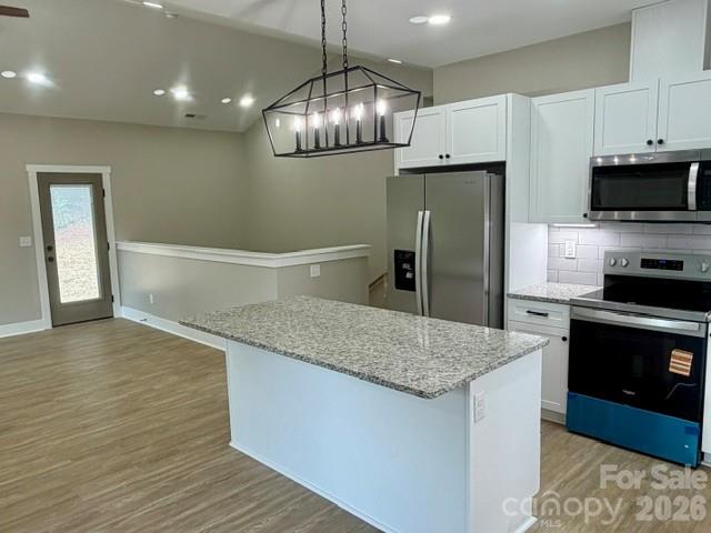 The bar adds eating area to this unique home! - 1135 Pinebrook Avenue SE, Valdese
