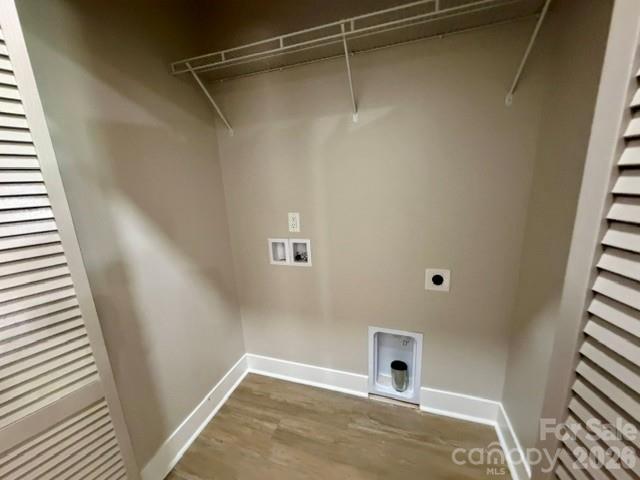 Laundry area conveniently located on main level hallway - 1135 Pinebrook Avenue SE, Valdese