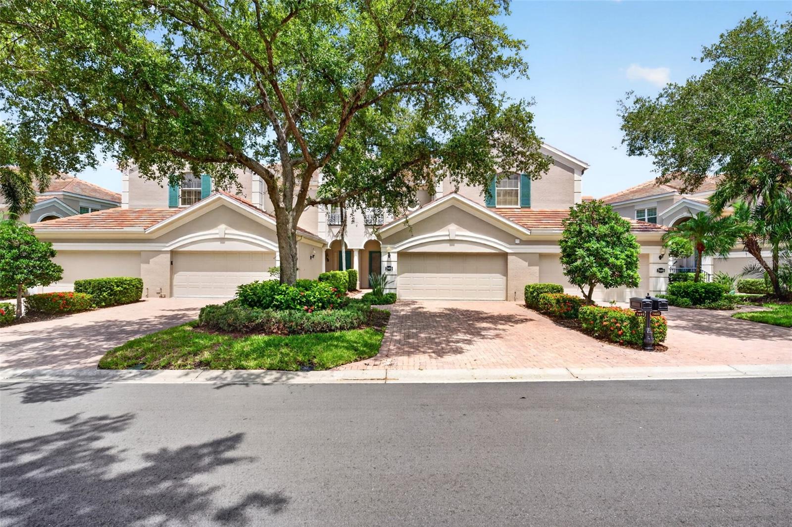 2 car garage, paved driveway - 7492 BOTANICA PKWY #102, SARASOTA